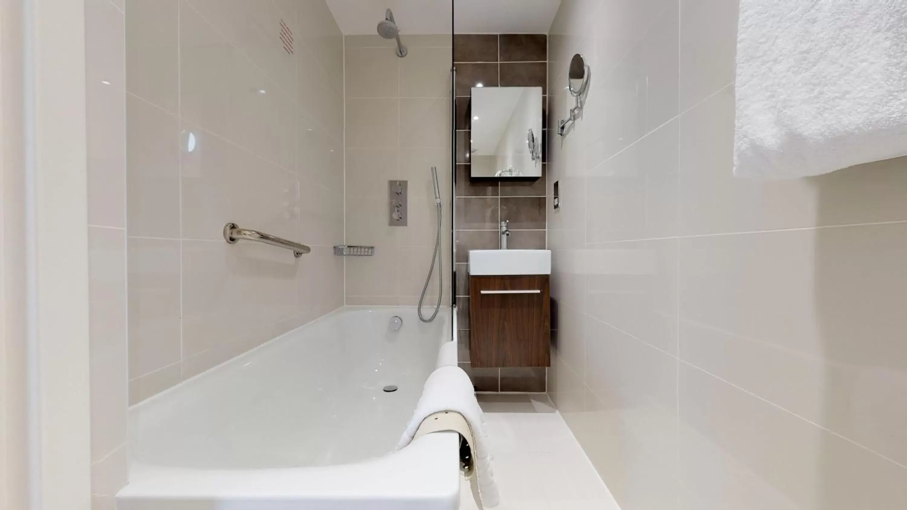 Bathroom in Holiday Inn London Kensington High St. by IHG Bathroom in Holiday Inn London Kensington High St. by IHG