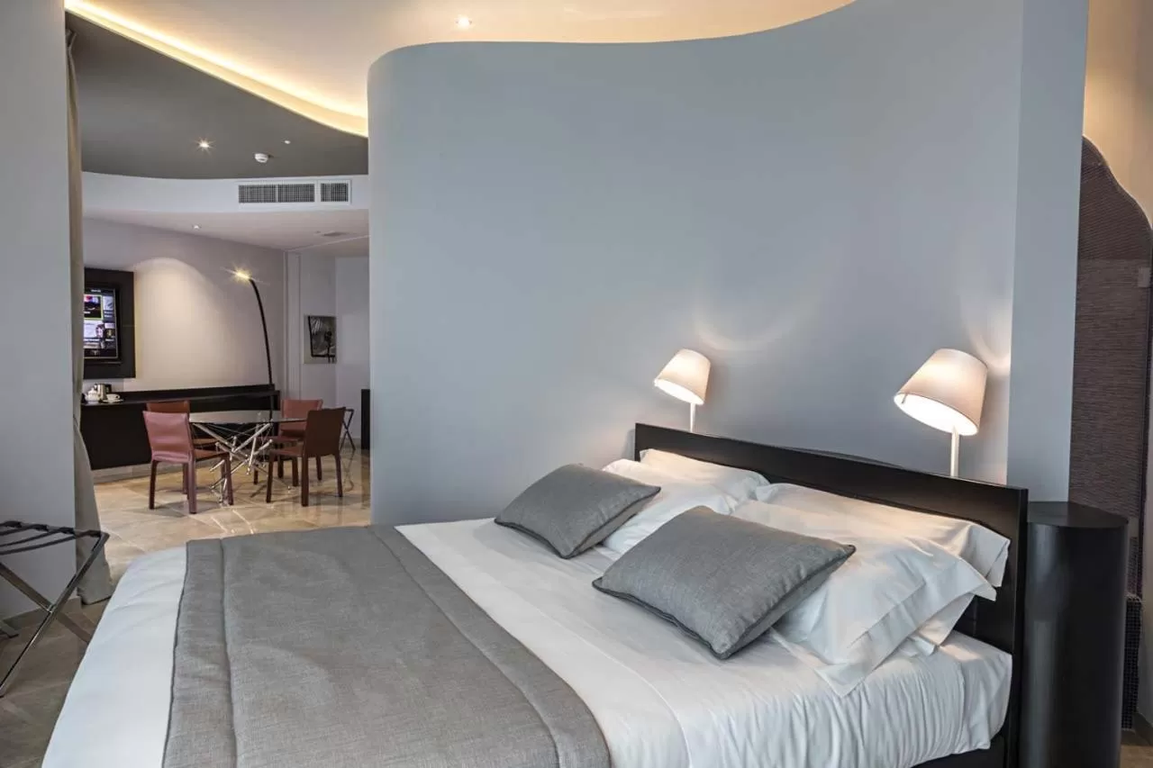 Living room, Bed in Borgo San Barbato Resort Spa & Golf
