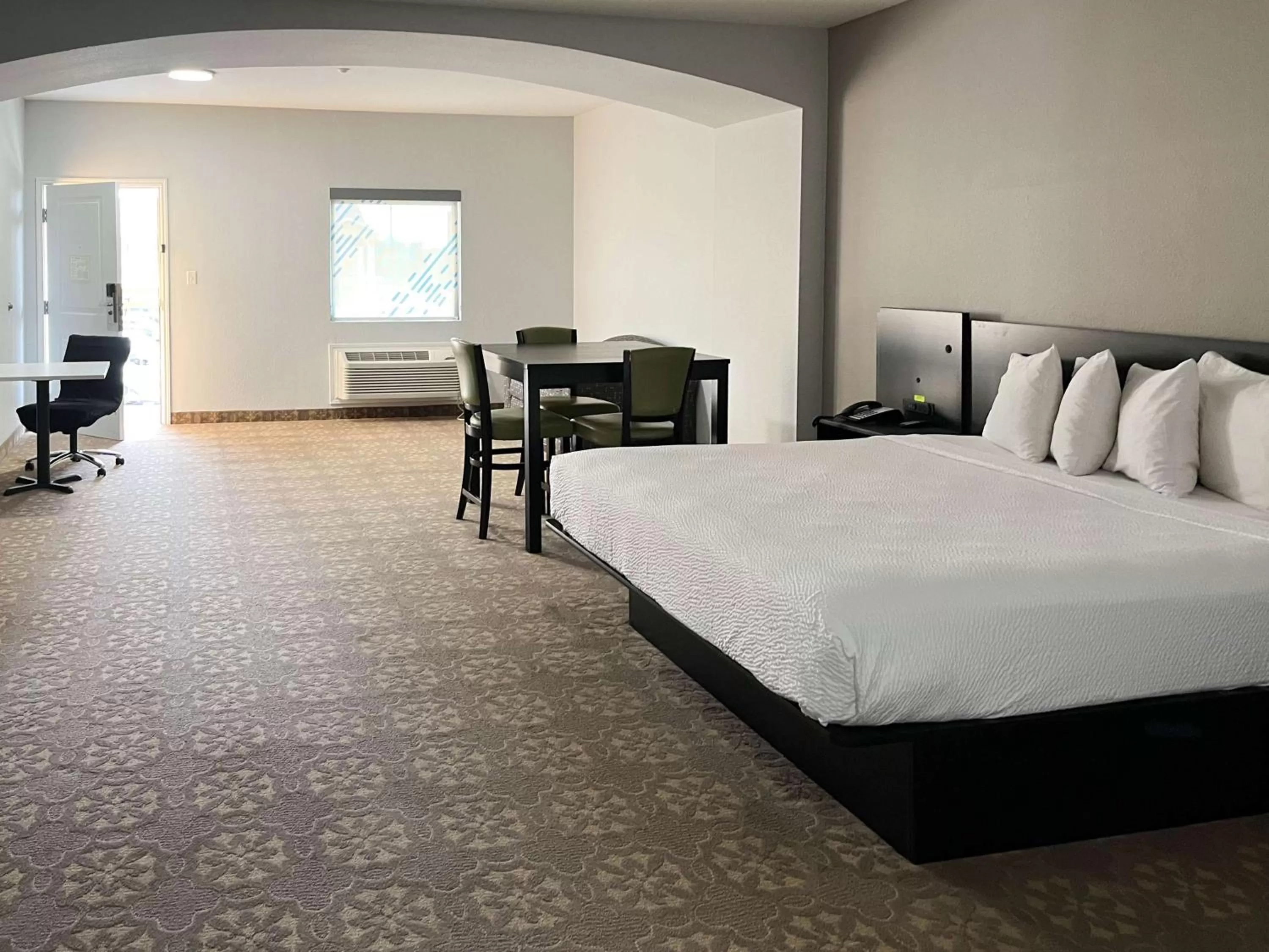 King Room with Roll-in Shower - Disability Access - Non-Smoking in Days Inn & Suites by Wyndham Gonzales TX