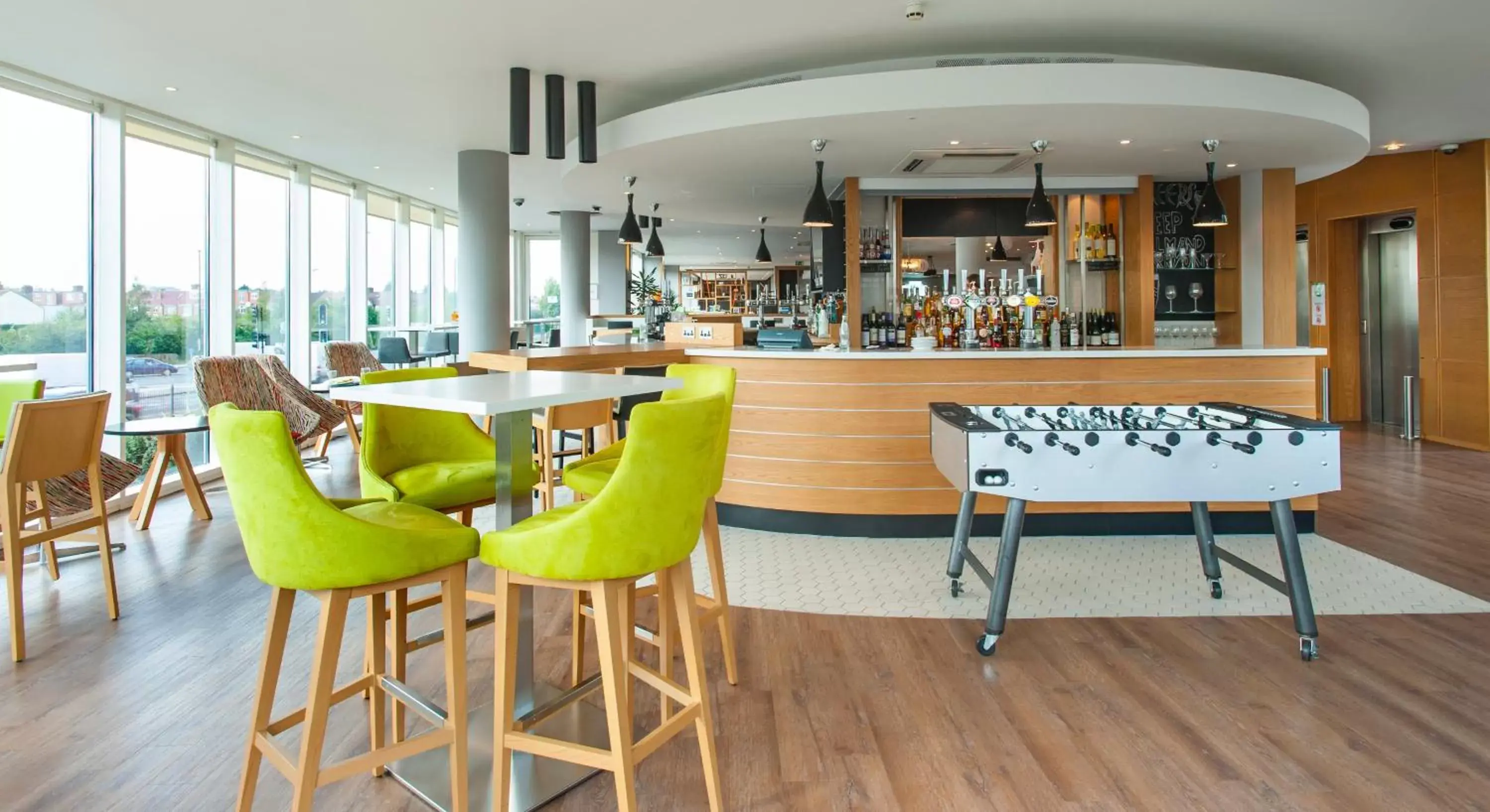 Lounge or bar in Holiday Inn London West by IHG Lounge or bar in Holiday Inn London West by IHG
