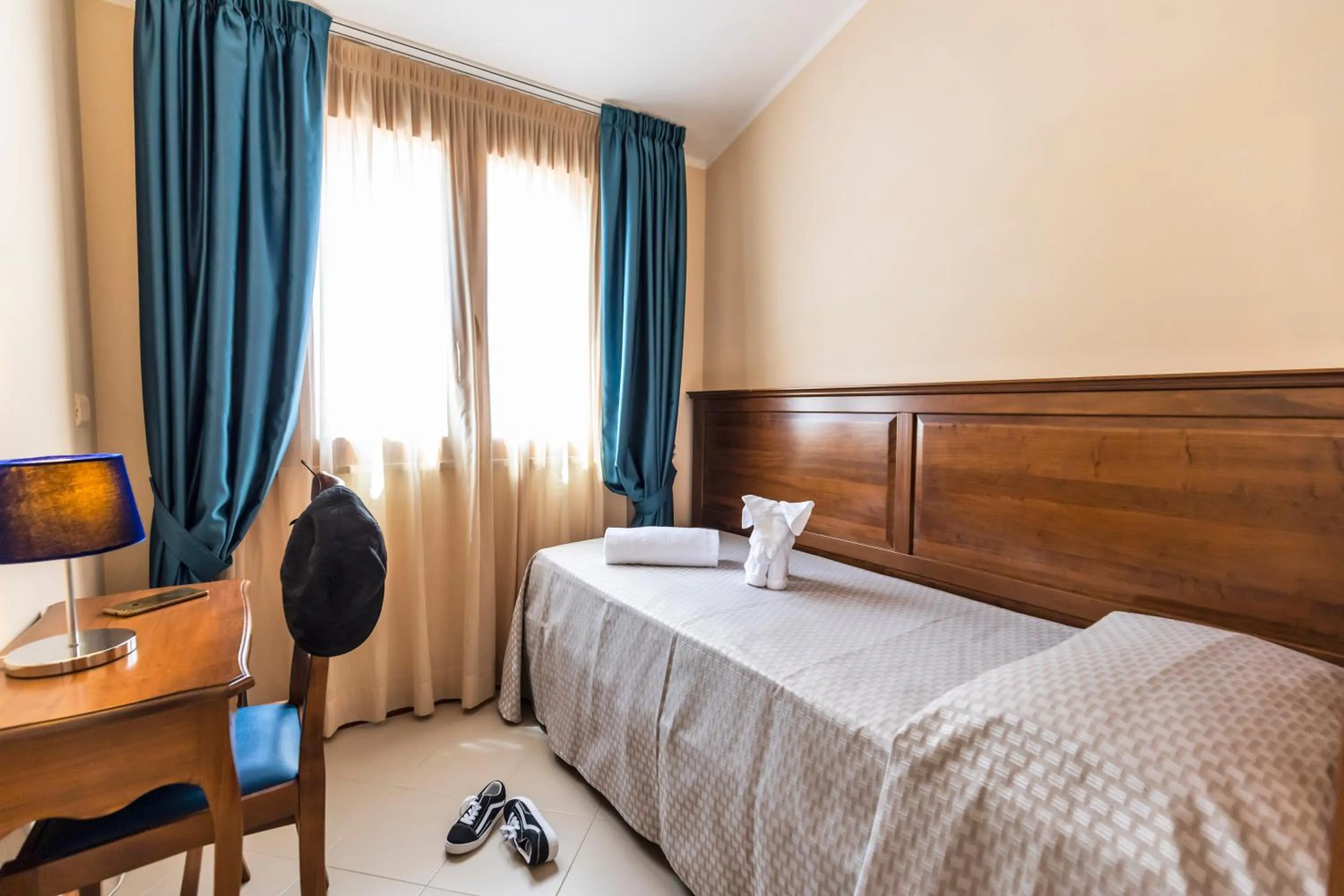 Bed in Tropis Hotel