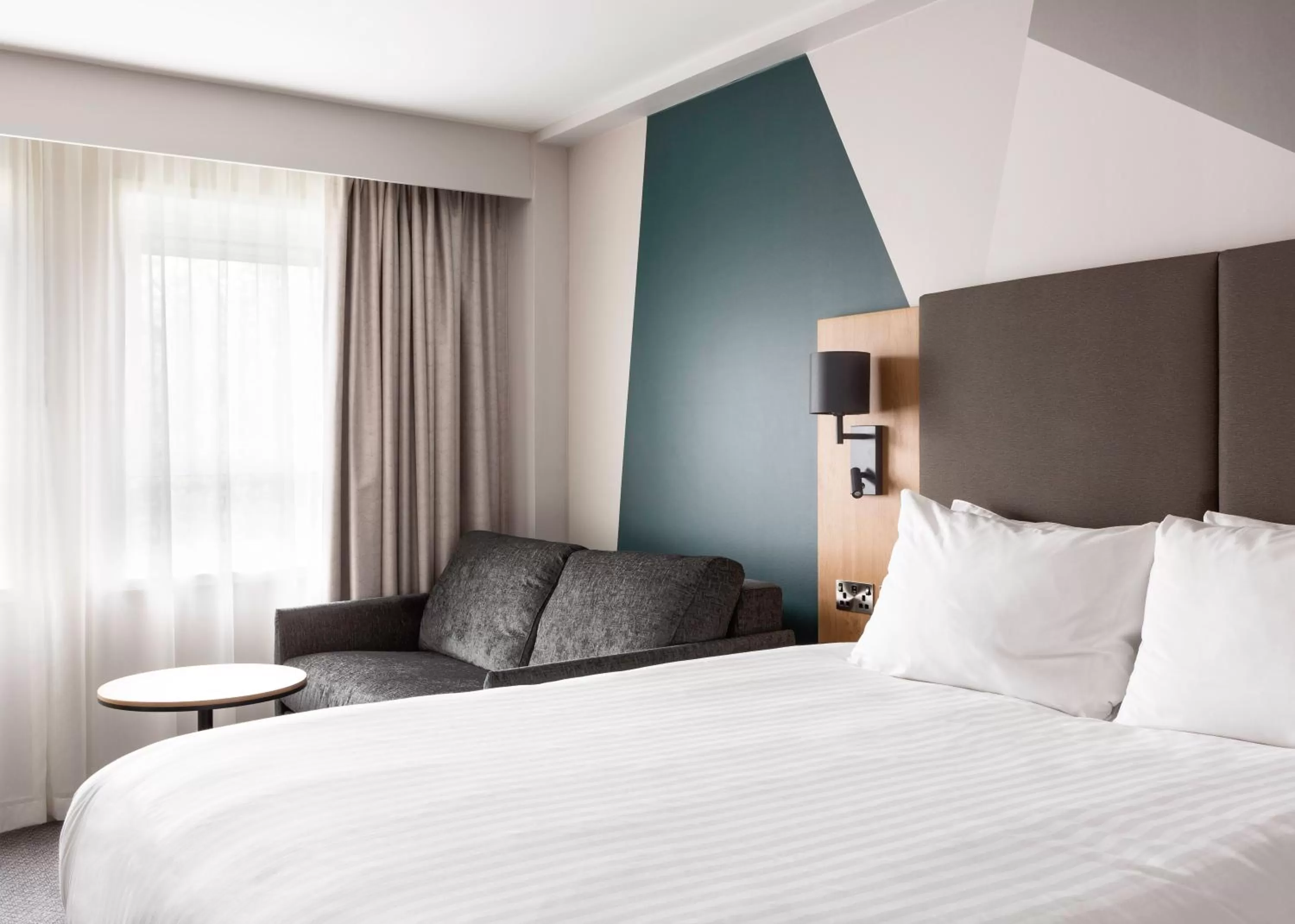 Seating area, Bed in Holiday Inn London-Bexley by IHG