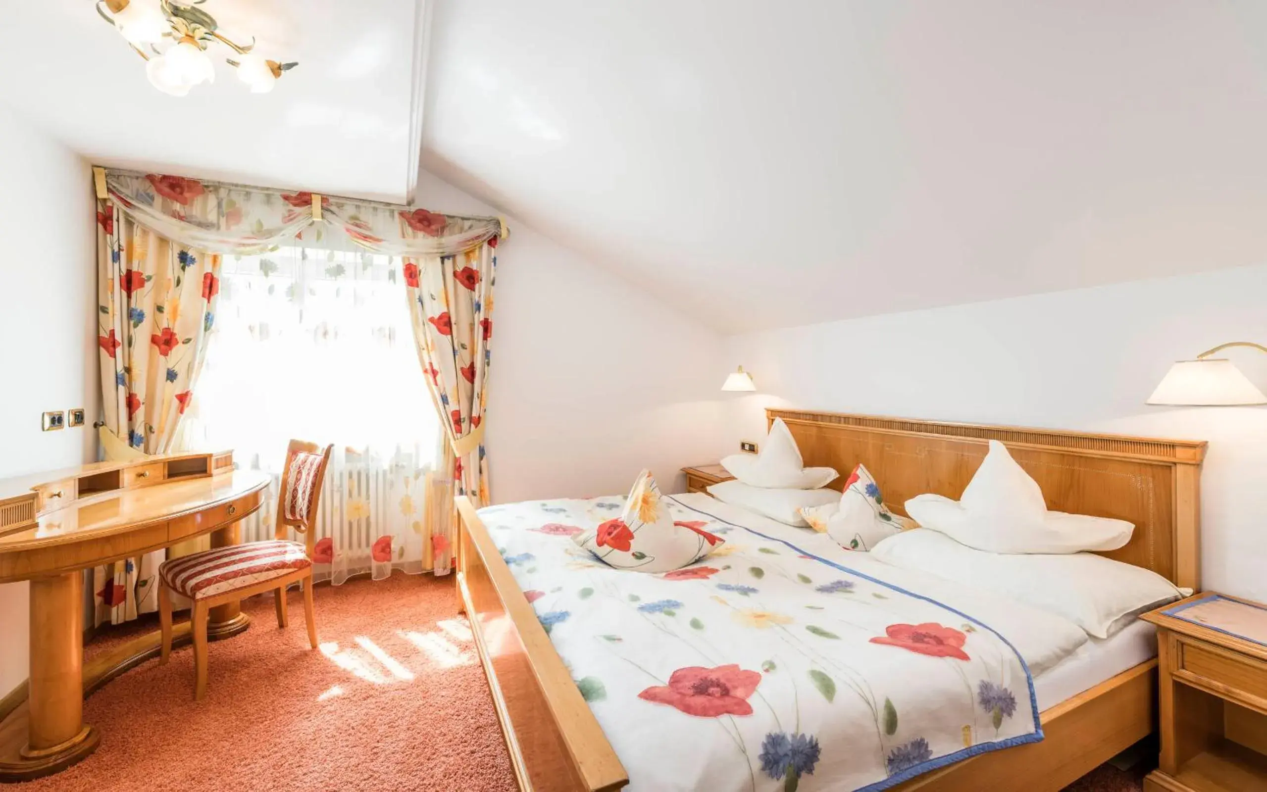 Bed in Romantik Hotel & Restaurant Stafler Bed in Romantik Hotel & Restaurant Stafler