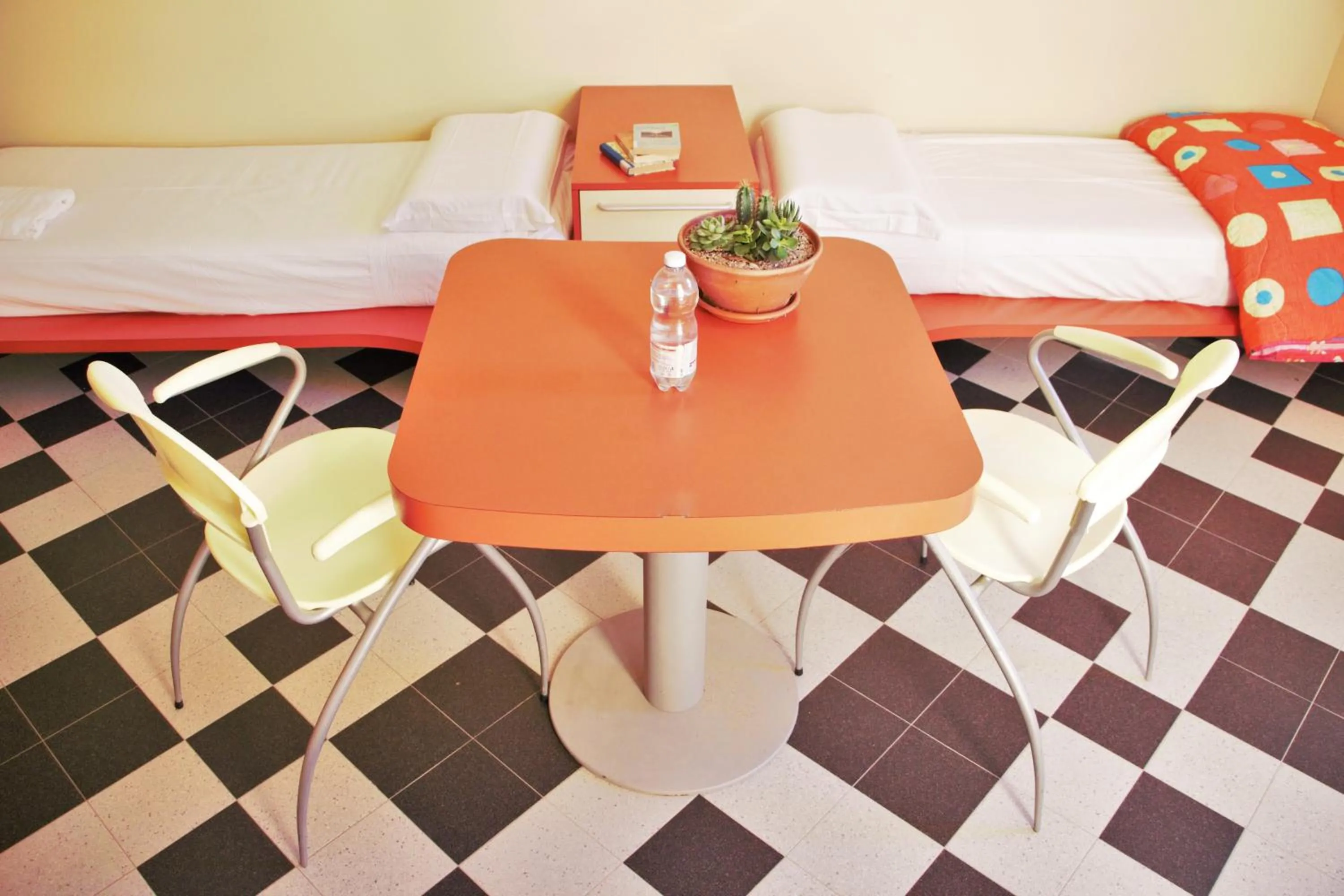 Economy Quadruple Room with Shared Bathroom in Ostello La Miniera