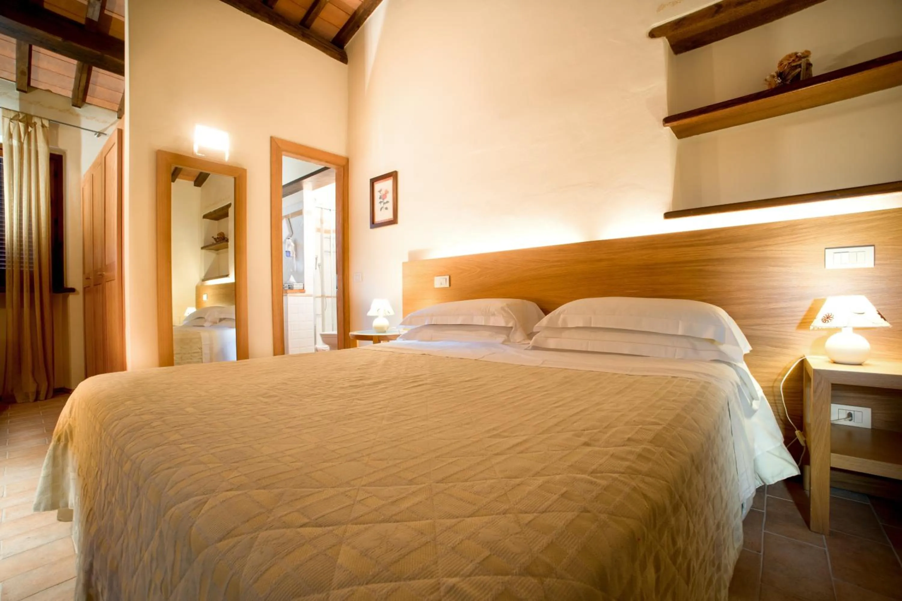 Bed in Guesia Village Hotel e Spa