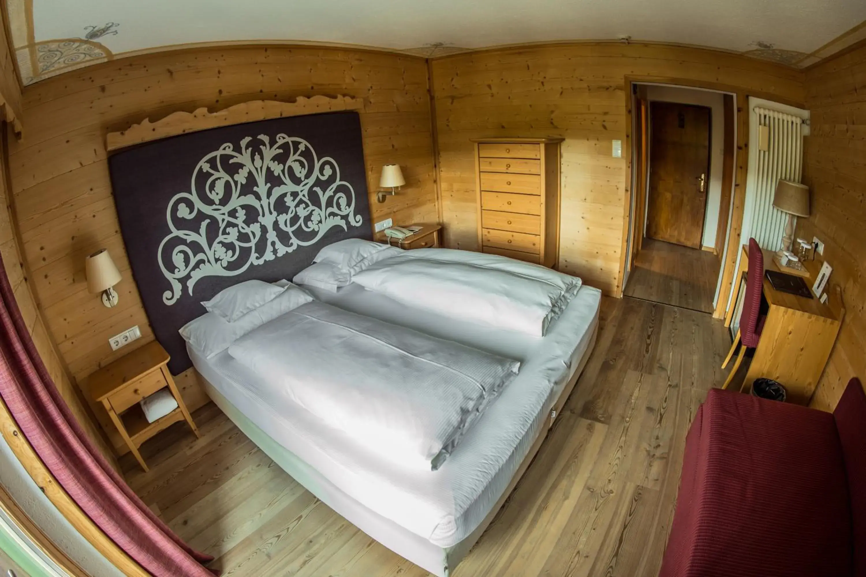 Bed in Hotel Ciasa Salares Bed in Hotel Ciasa Salares