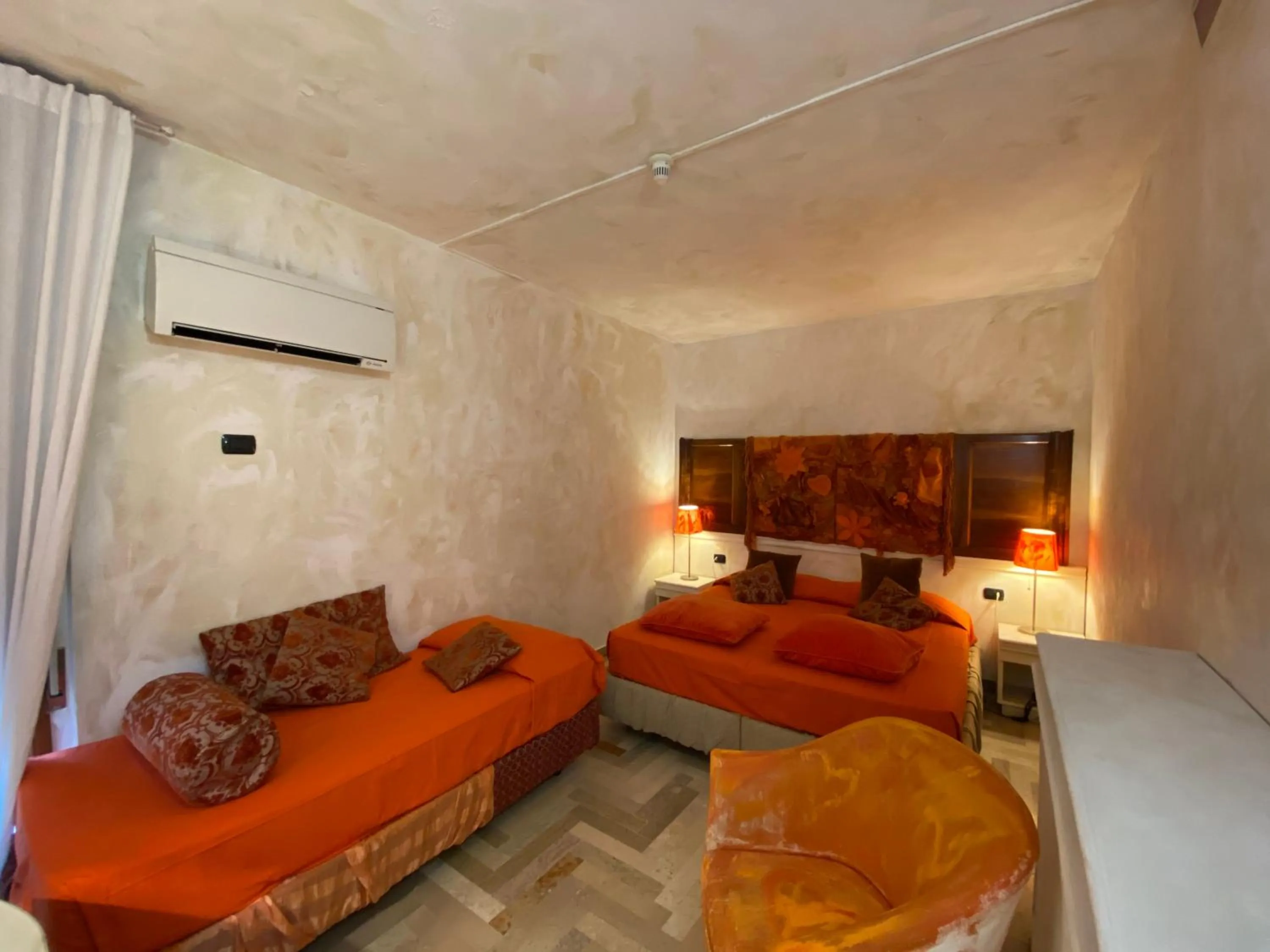 Bed in Art Hotel Al Fagiano