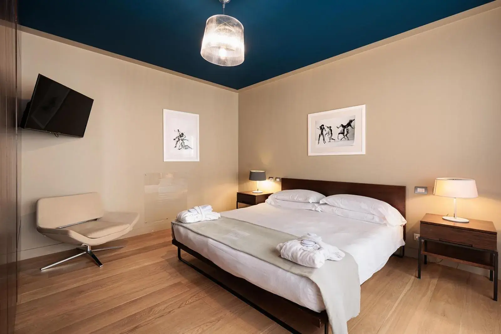 Bed in Escalus Luxury Suites Verona Bed in Escalus Luxury Suites Verona