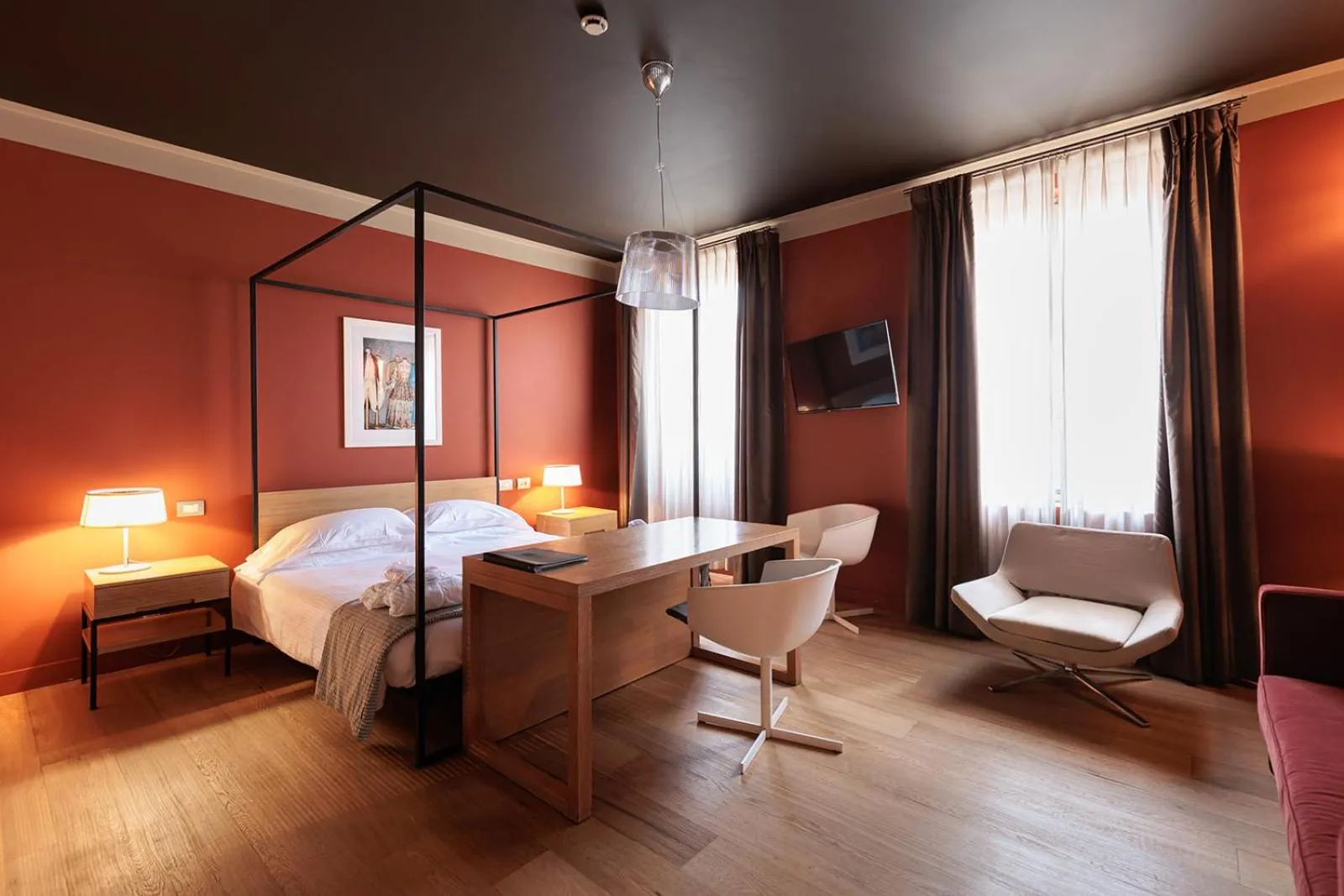 Bed in Escalus Luxury Suites Verona