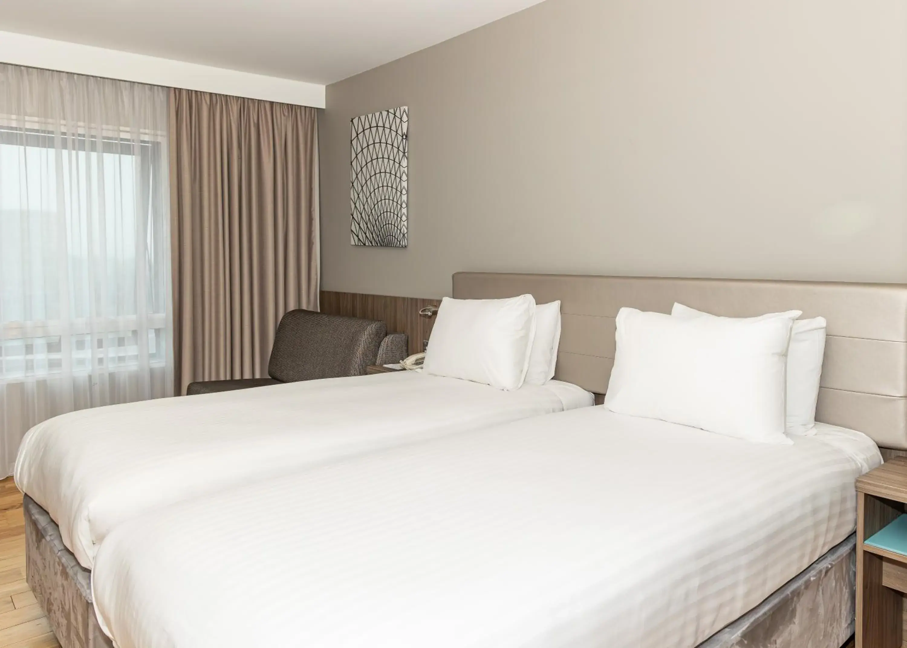 Bed in Holiday Inn London West by IHG Bed in Holiday Inn London West by IHG