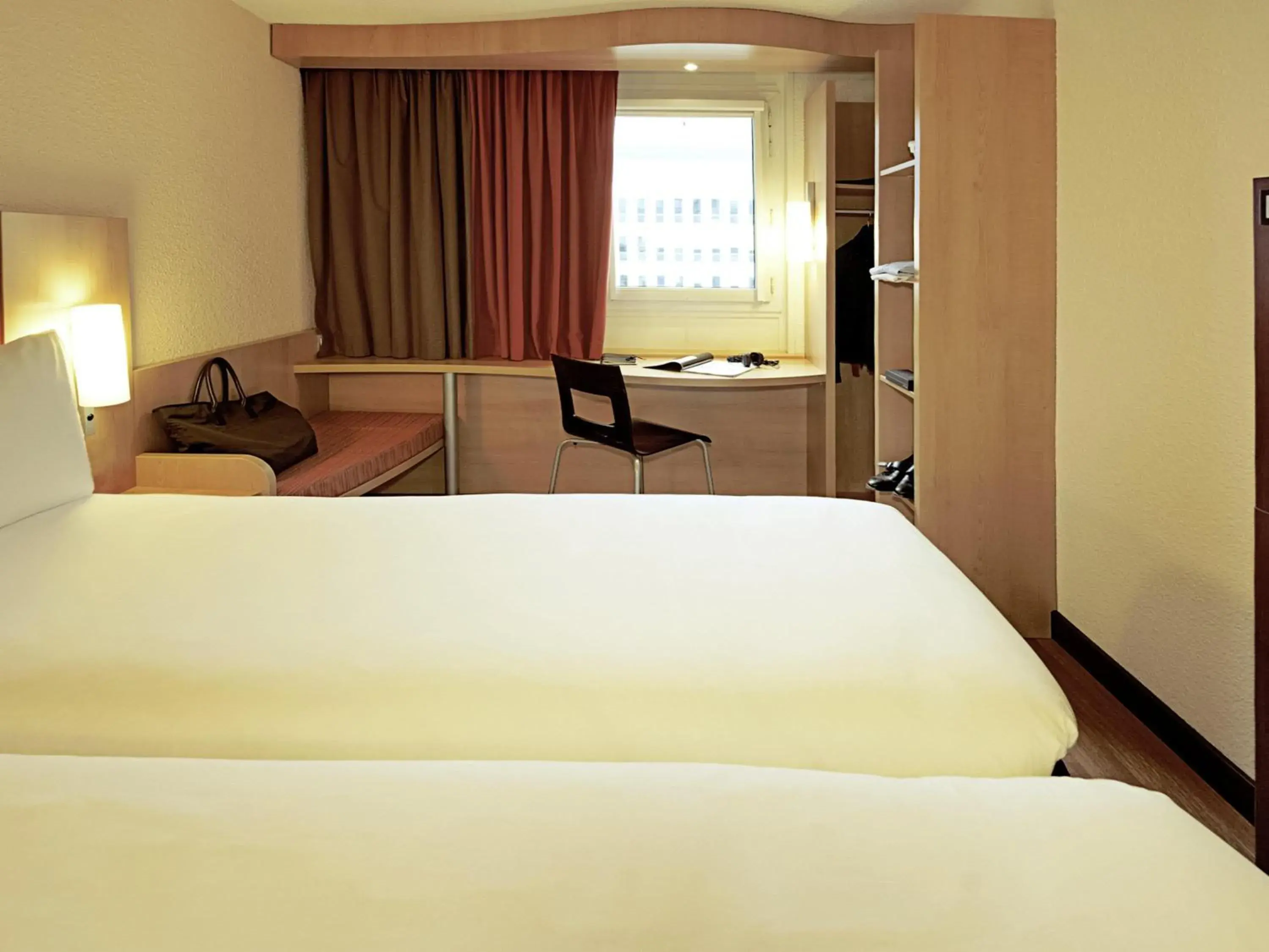 View (from property/room), Bed in Hotel Ibis Coimbra Centro View (from property/room), Bed in Hotel Ibis Coimbra Centro