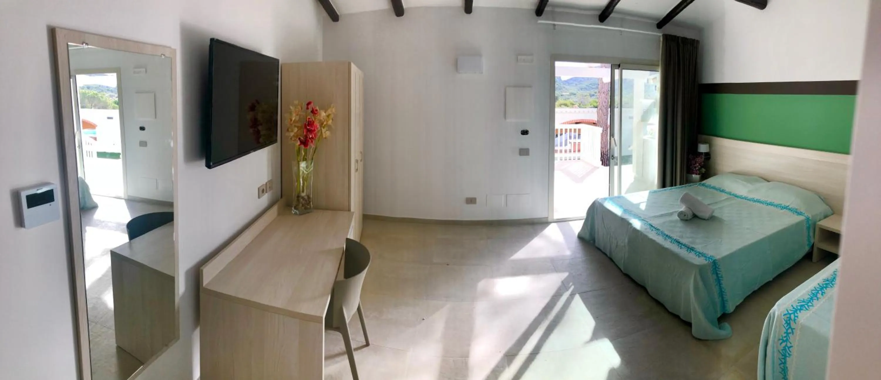 Photo of the whole room, Bed in Club Esse Cala Bitta