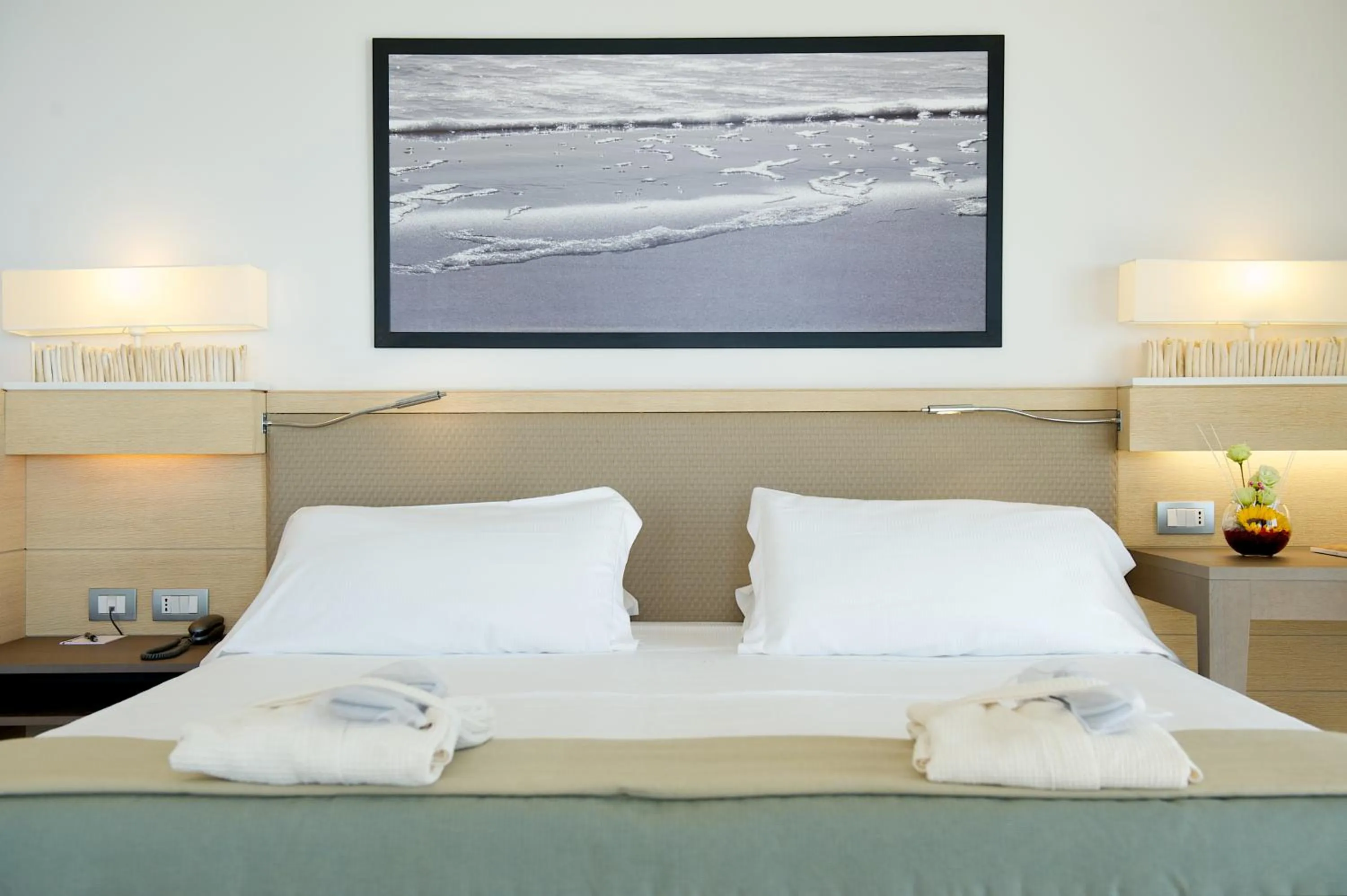 Bed in Capovaticano Resort Thalasso Spa
