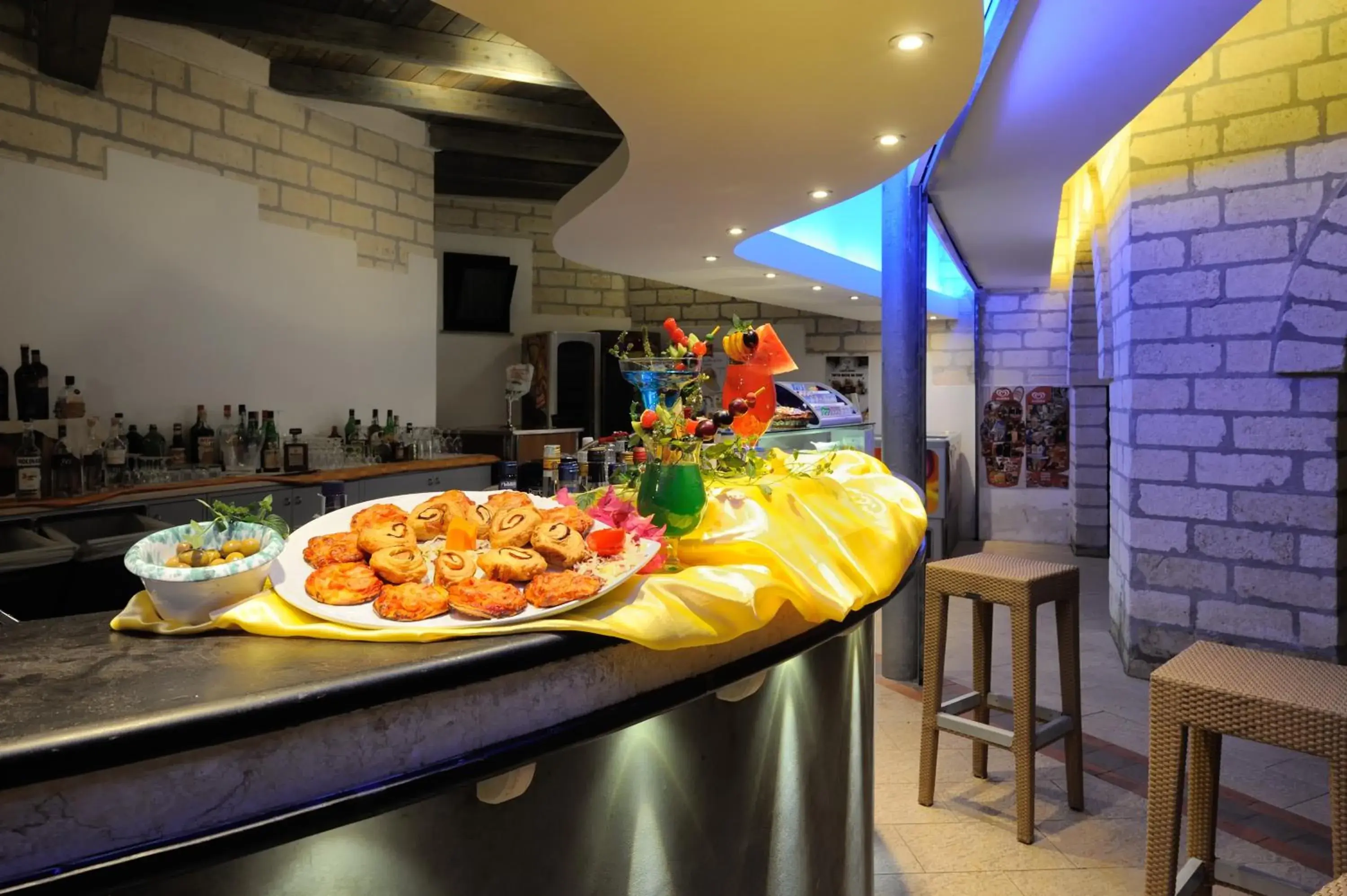 Lounge or bar in Baia Degli Aranci Suite & Apartments Lounge or bar in Baia Degli Aranci Suite & Apartments