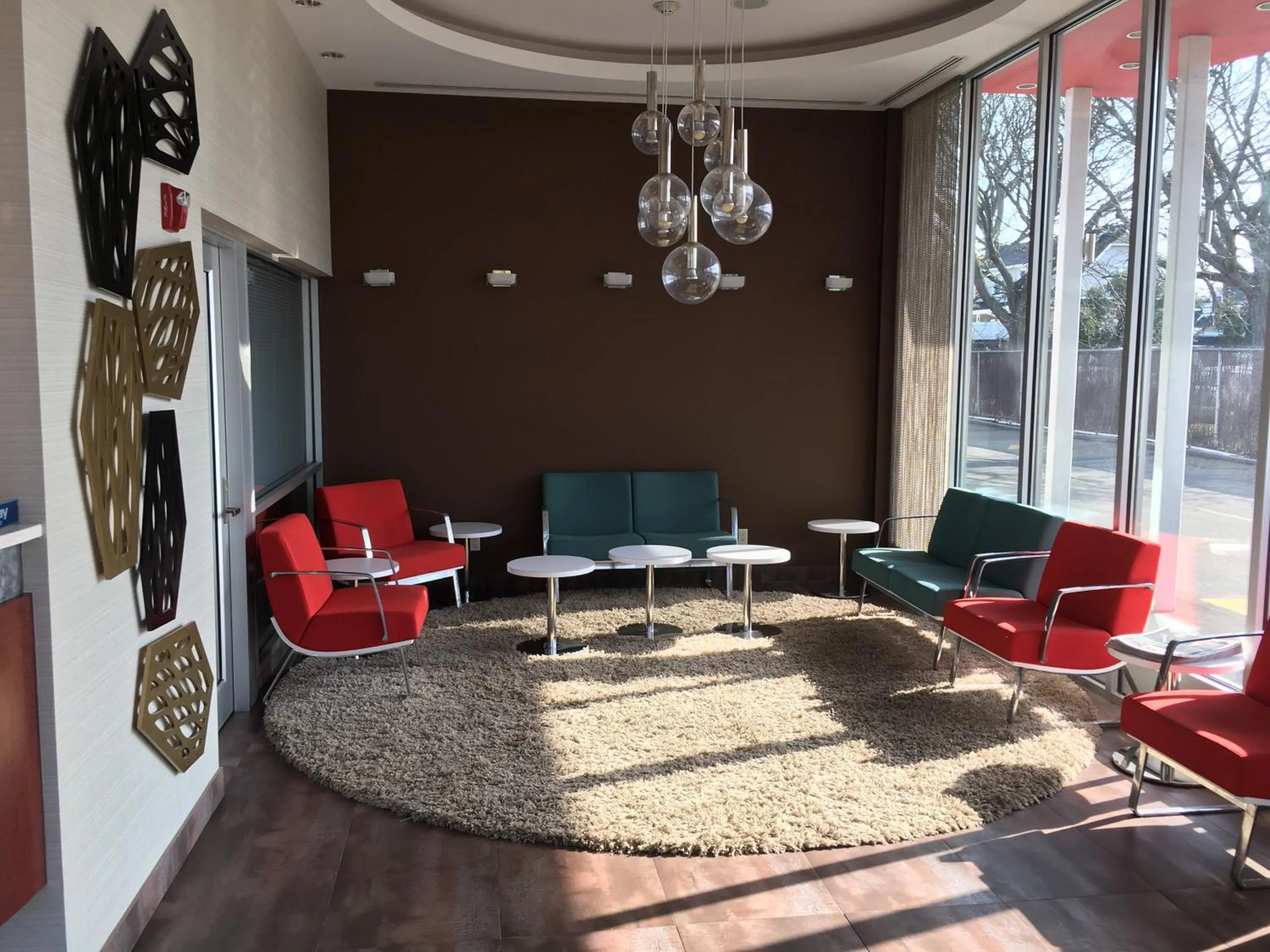 Lobby or reception in Ramada by Wyndham Rockville Centre