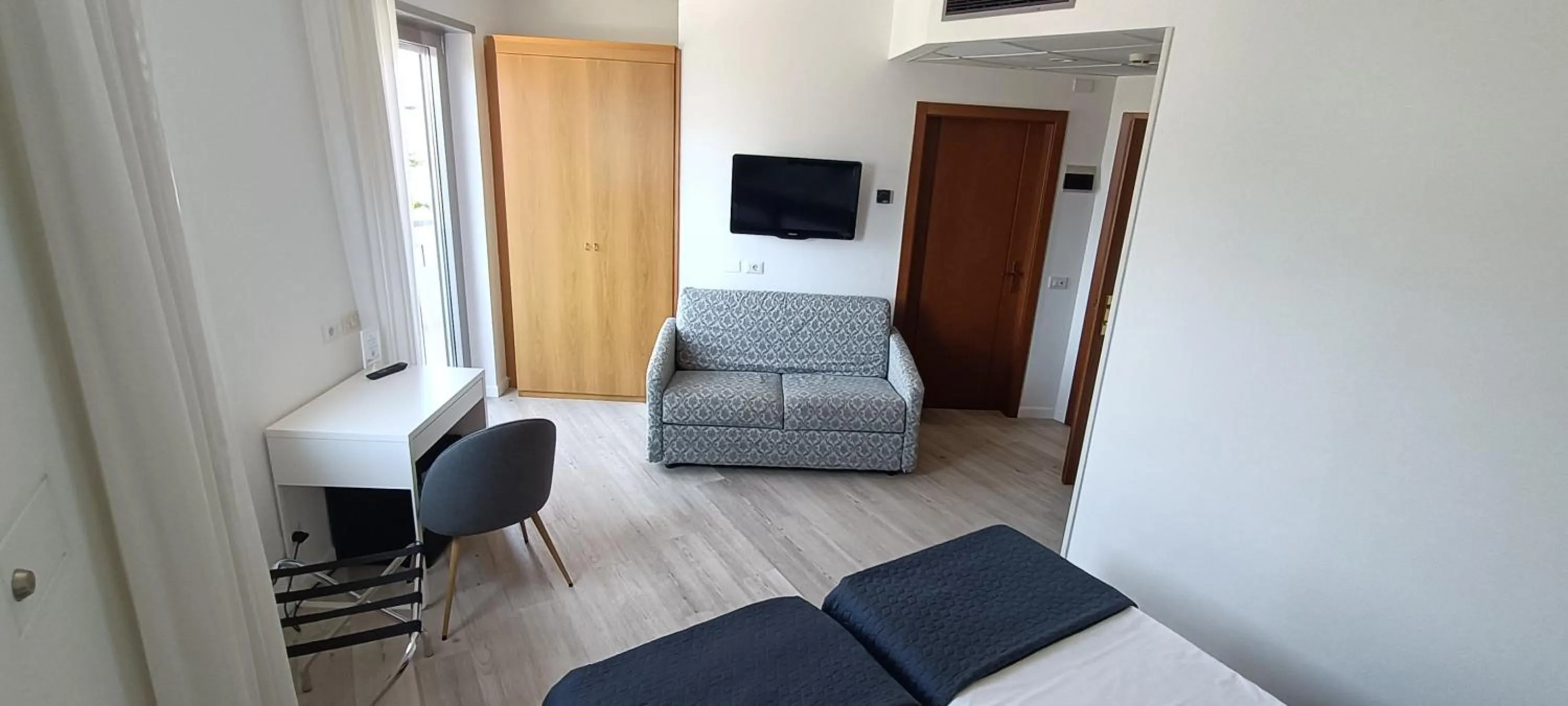 Bedroom in Hotel Everest Arco