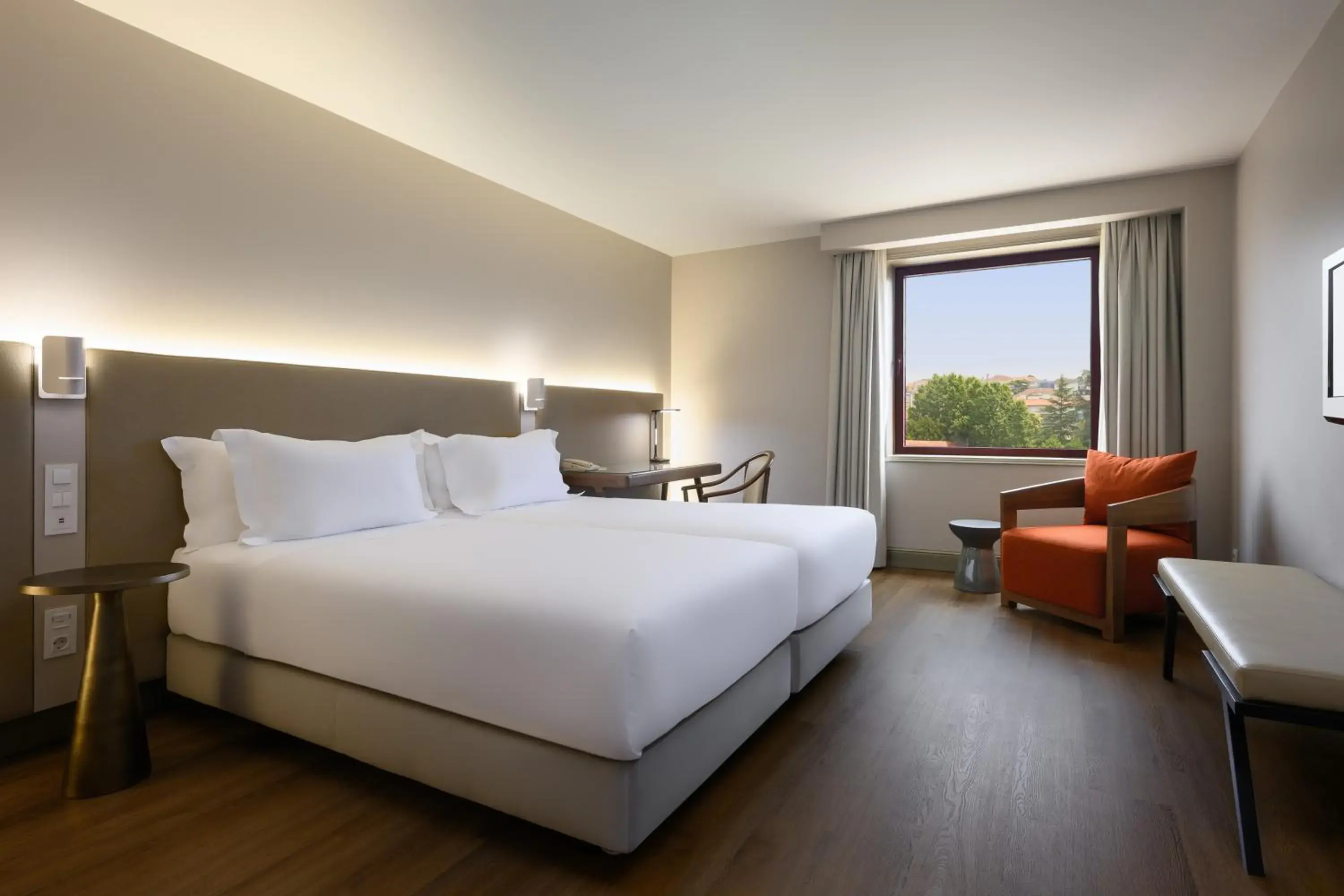 Bed in Hotel Coimbra Aeminium Affiliated by Meliá Bed in Hotel Coimbra Aeminium Affiliated by Meliá