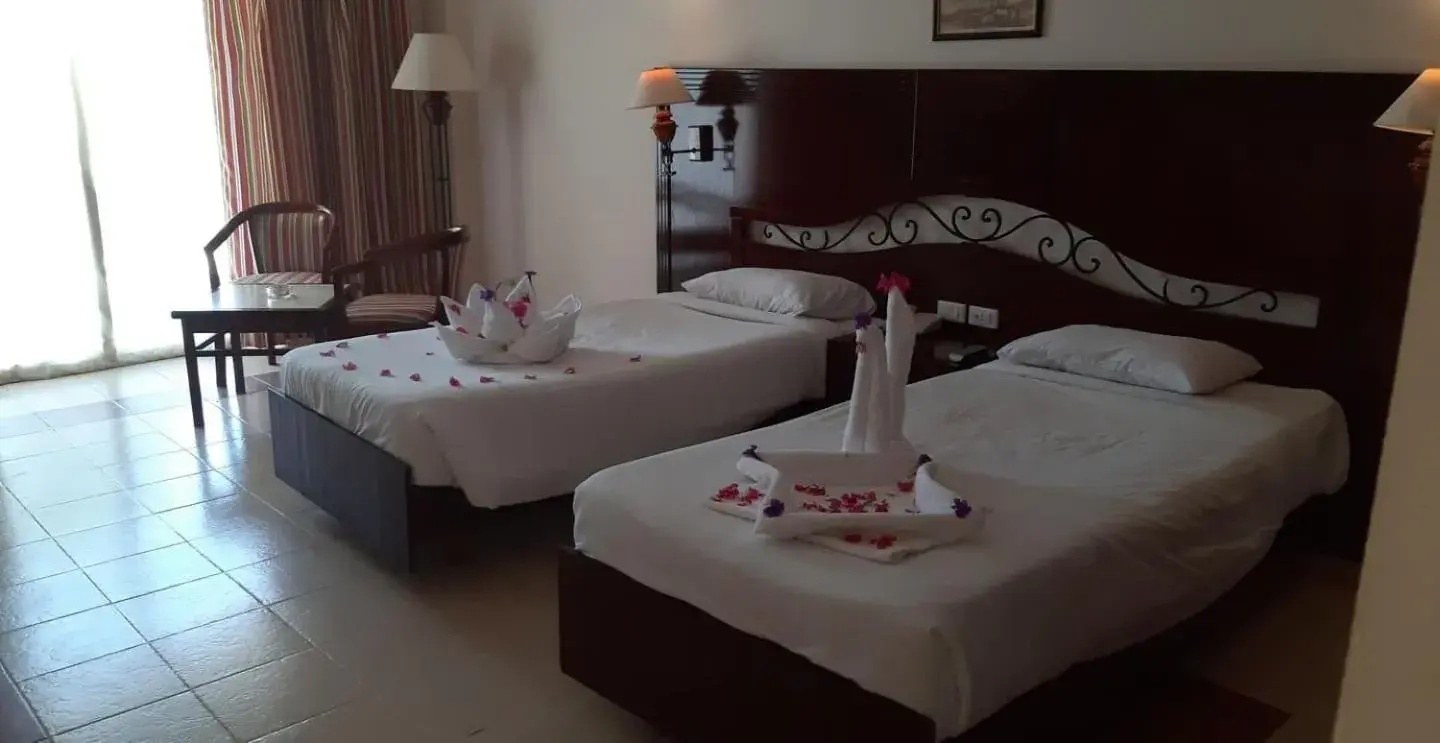 Bed in Royal Brayka Beach Resort Bed in Royal Brayka Beach Resort