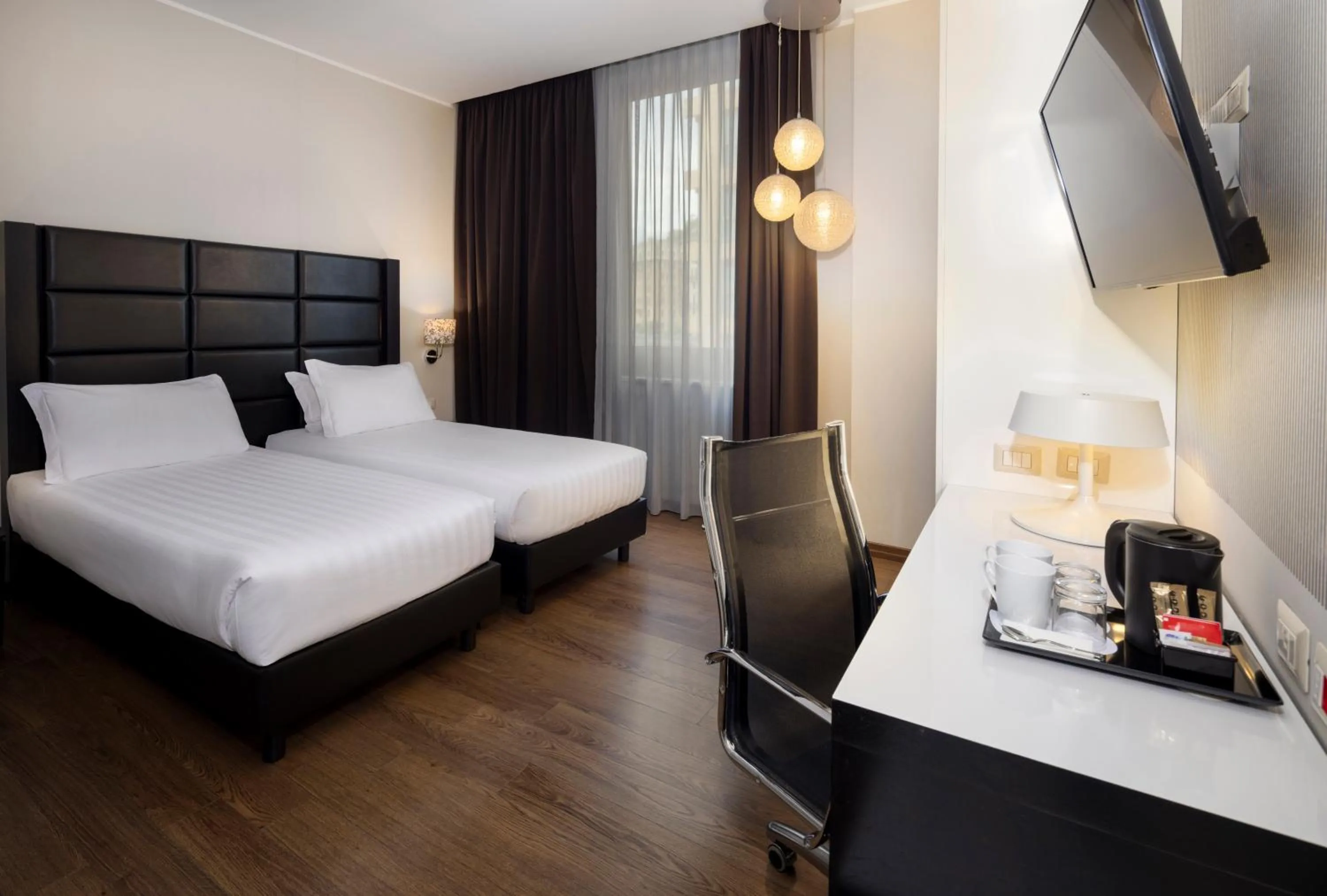 Photo of the whole room, Bed in Holiday Inn Genoa City by IHG