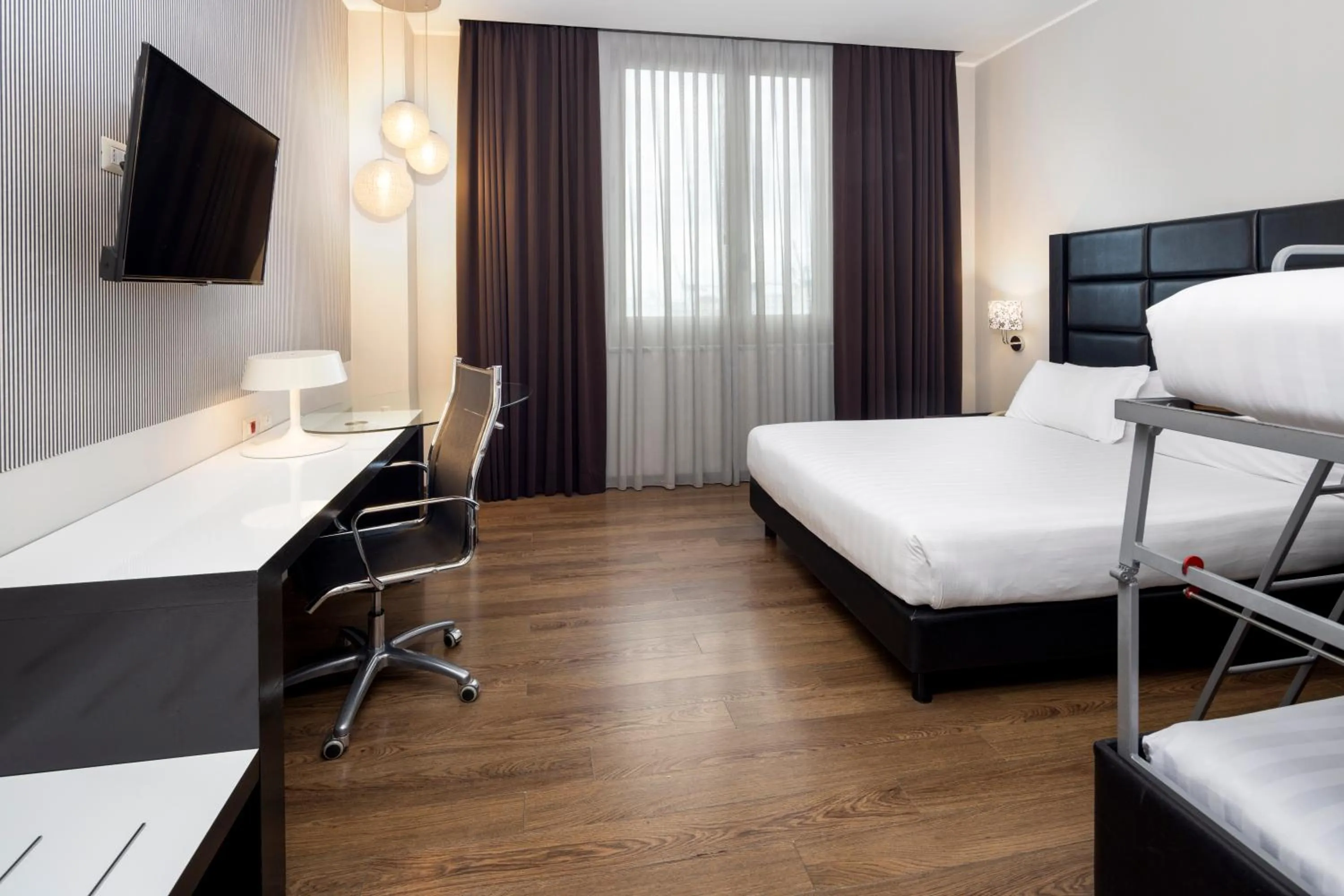 Photo of the whole room, Bed in Holiday Inn Genoa City by IHG
