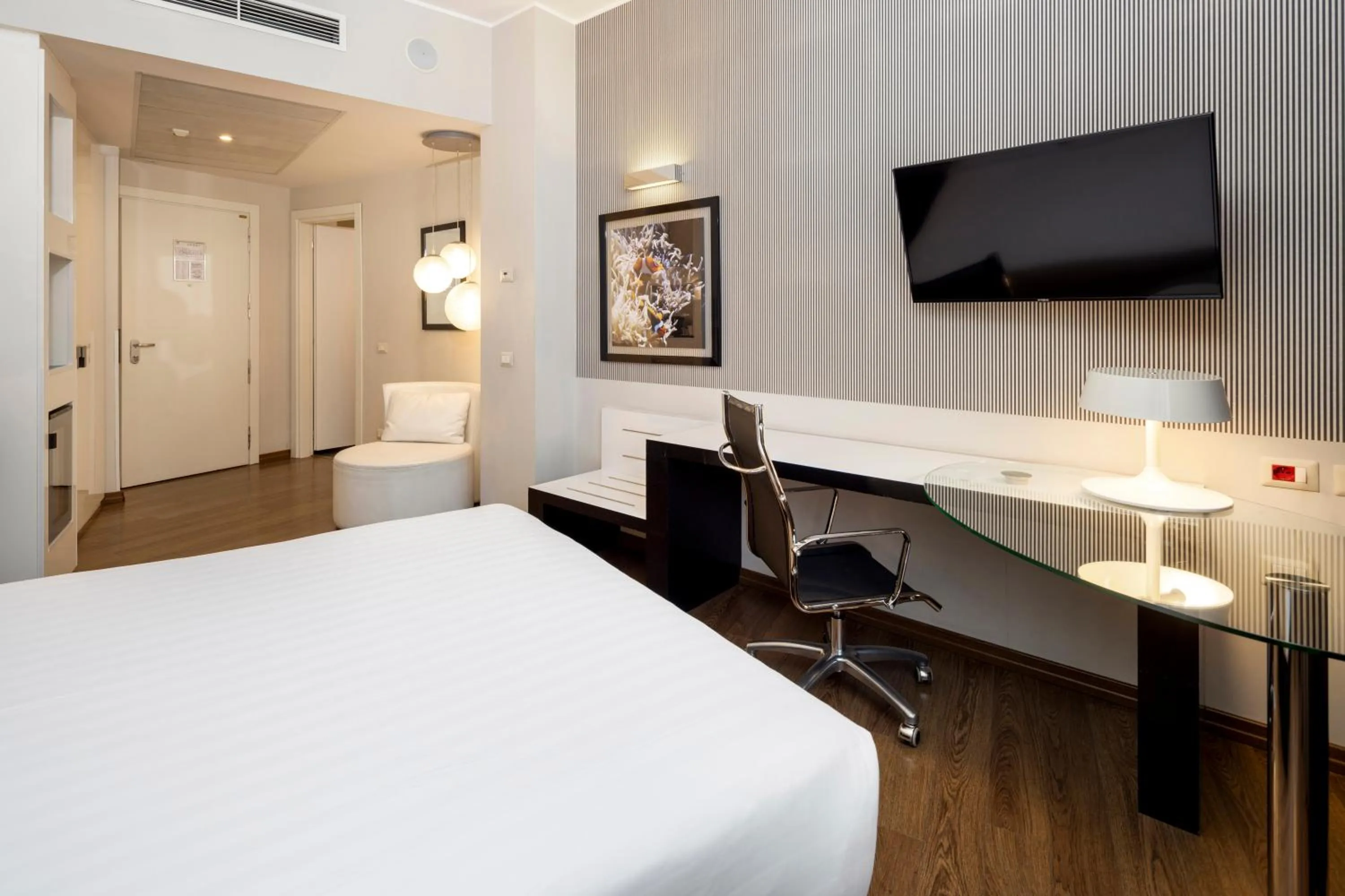 Photo of the whole room, Bed in Holiday Inn Genoa City by IHG