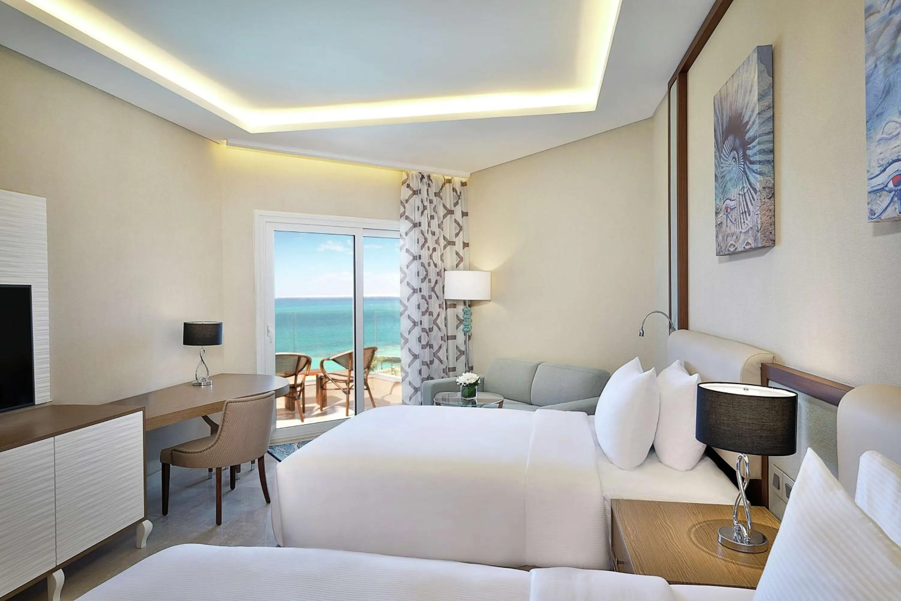 Seating area, Bed in Hilton Hurghada Plaza Hotel