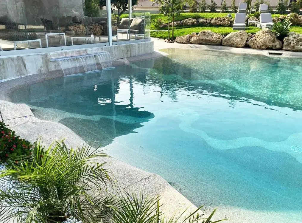 Swimming pool in Suite Hotel L'Oasi di Riaci Swimming pool in Suite Hotel L'Oasi di Riaci