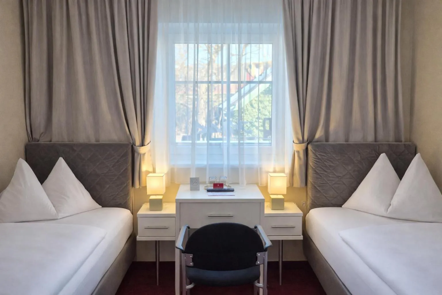 Small Twin Room - single occupancy in Stadthotel Kramer