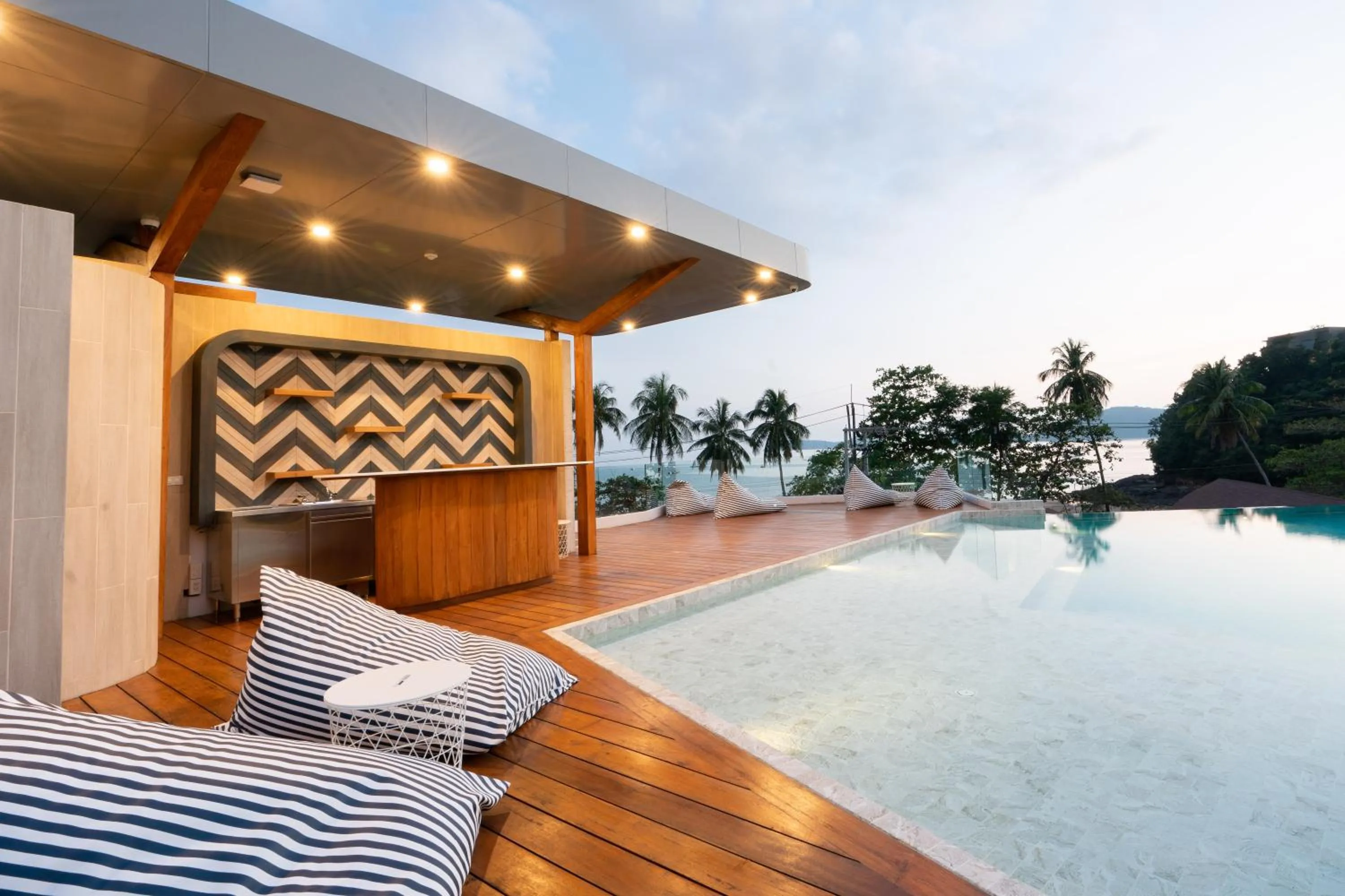 Swimming pool in Panwaburi Beachfront Resort - SHA Extra Plus