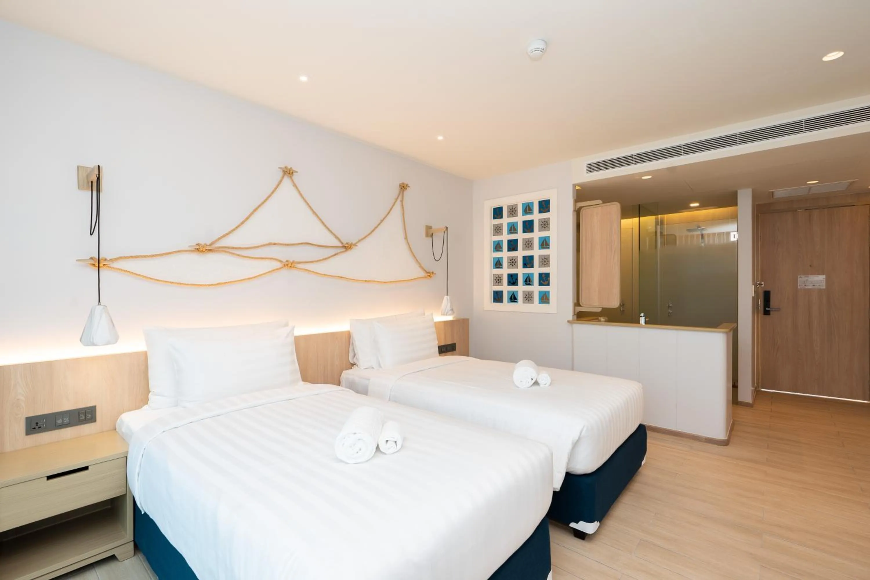 Bed in Panwaburi Beachfront Resort - SHA Extra Plus