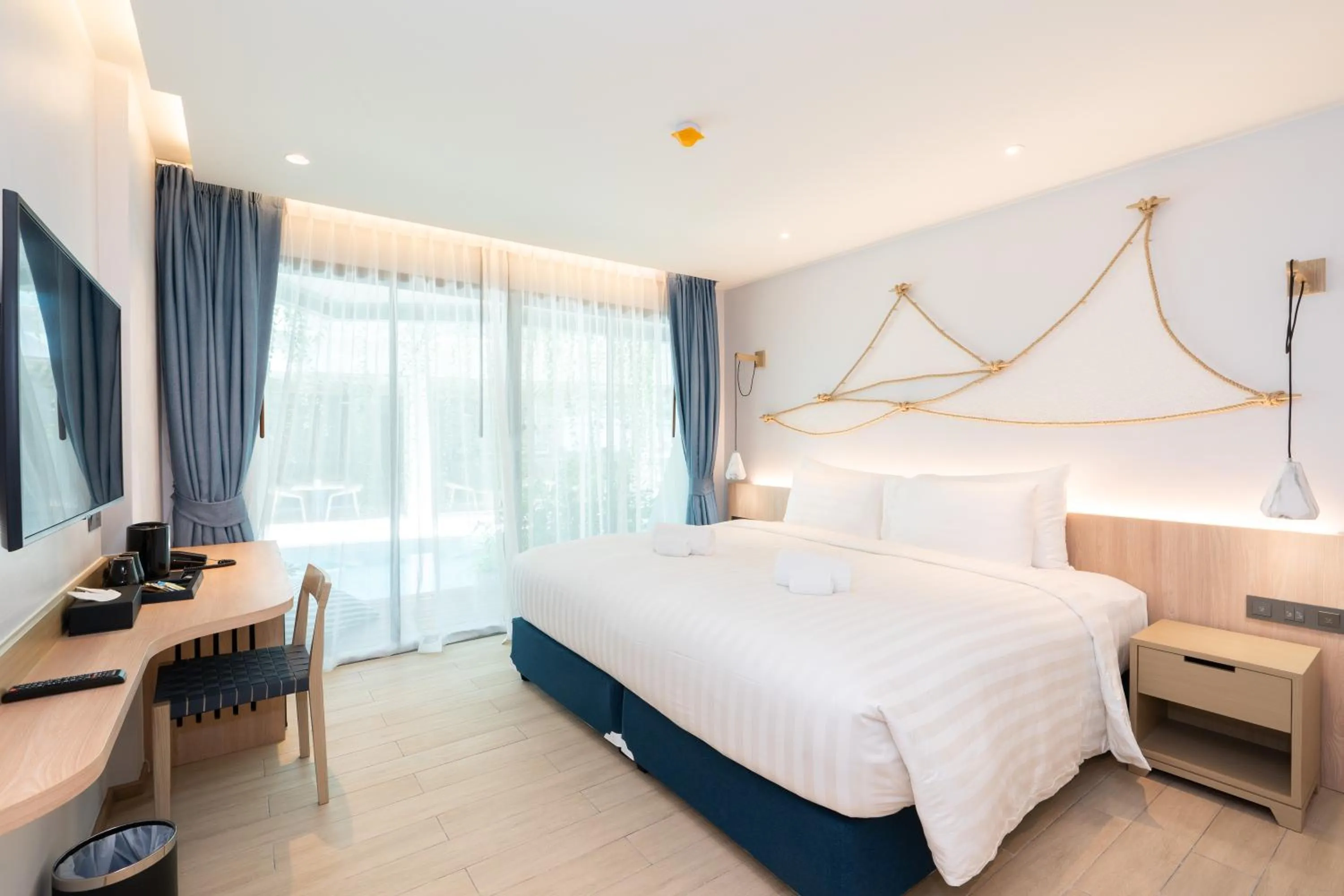 Bed in Panwaburi Beachfront Resort - SHA Extra Plus