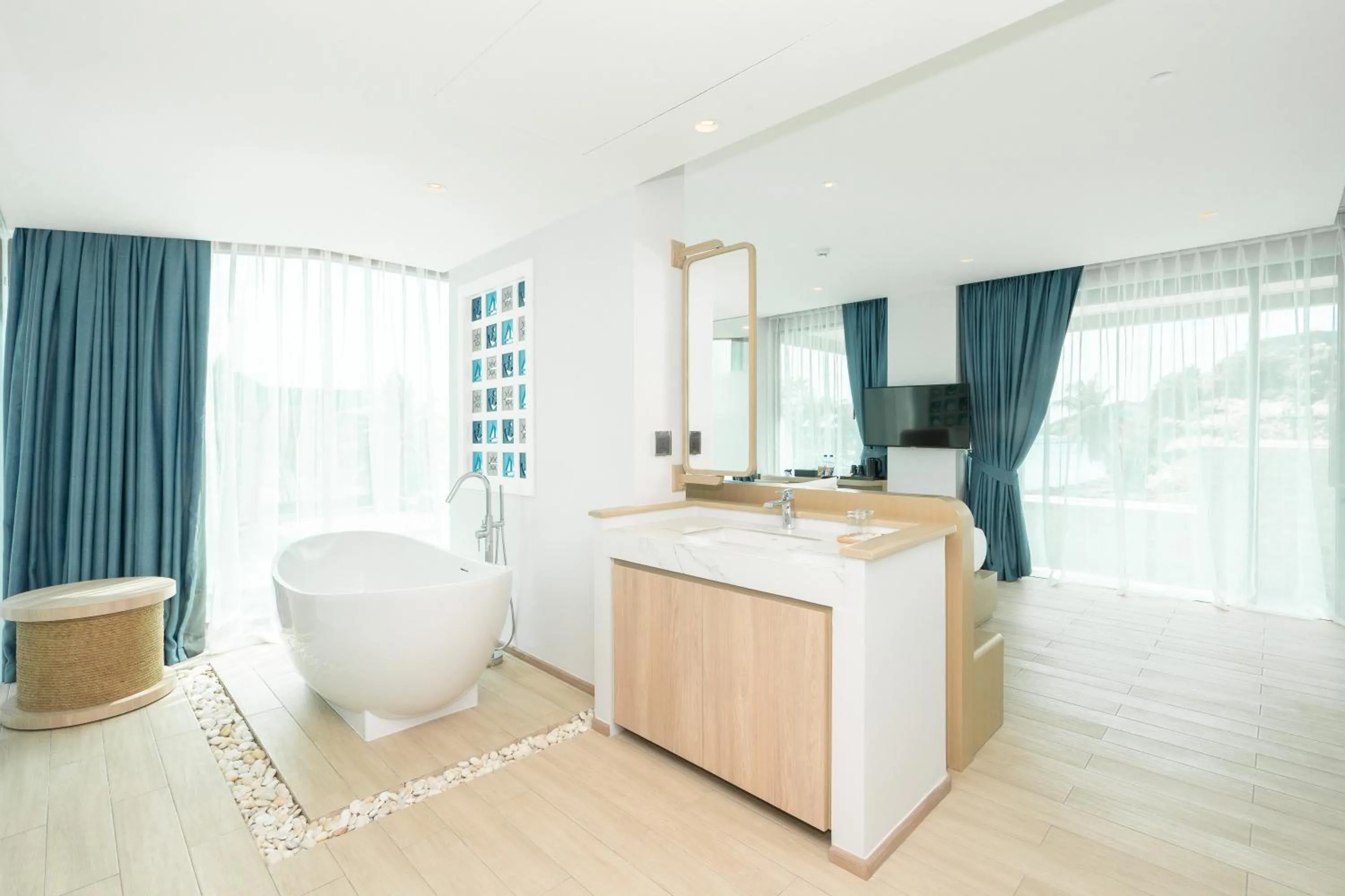 Bathroom in Panwaburi Beachfront Resort - SHA Extra Plus