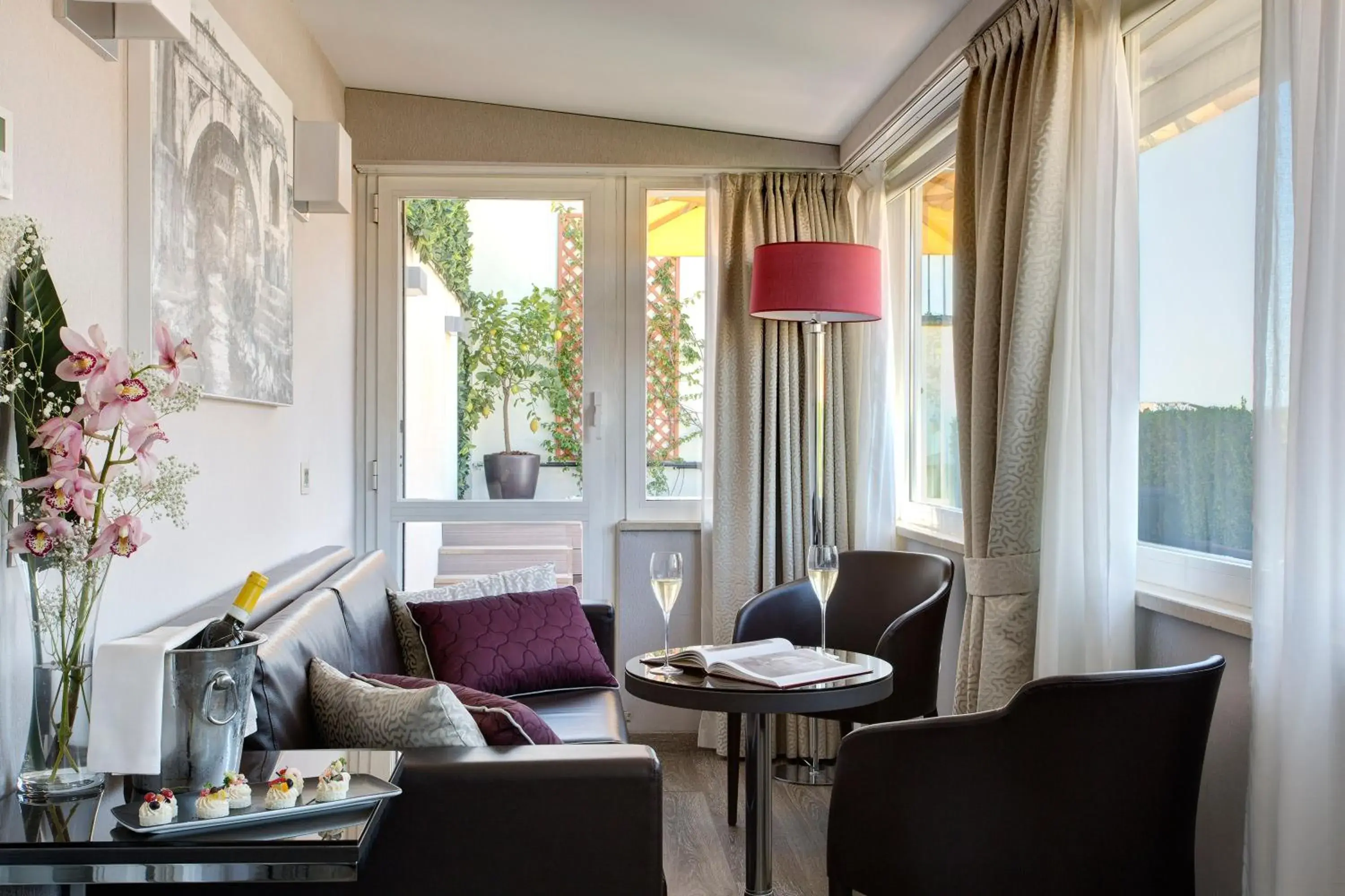 Living room in Hotel Artemide Living room in Hotel Artemide