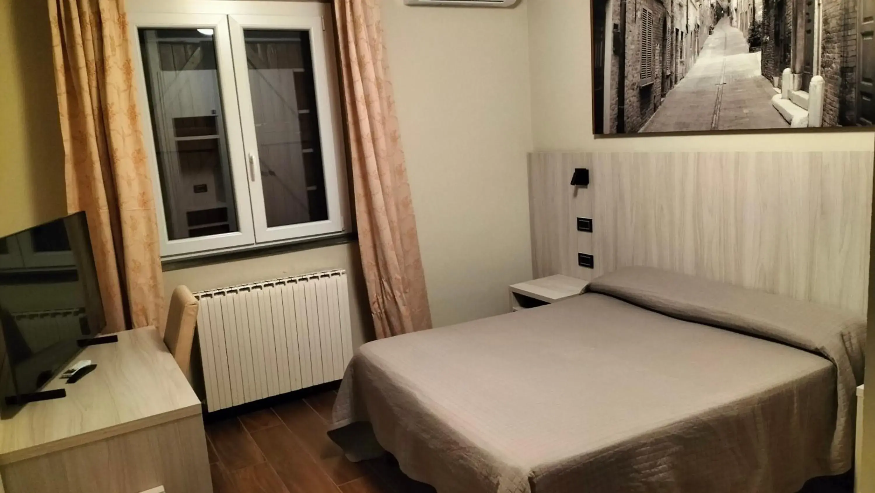 Bed in Hotel La Meridiana Bed in Hotel La Meridiana
