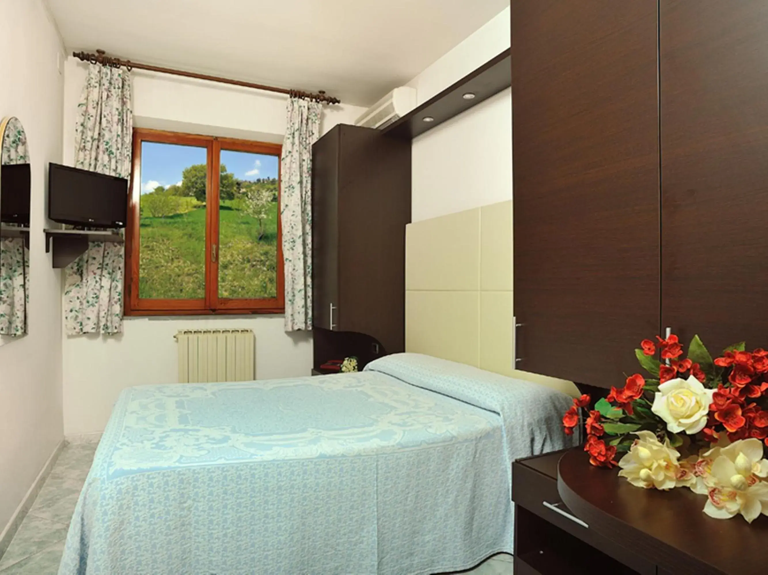 Bedroom, Bed in Hotel La Meridiana Bedroom, Bed in Hotel La Meridiana