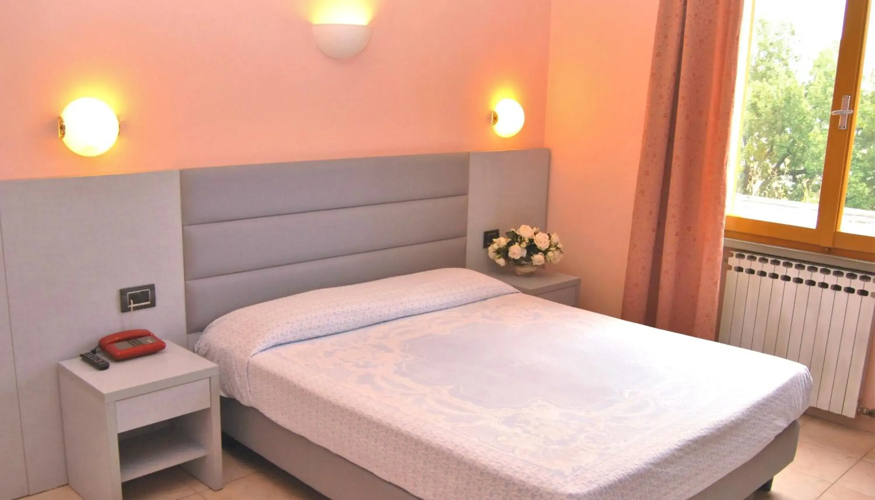 Photo of the whole room, Bed in Hotel La Meridiana Photo of the whole room, Bed in Hotel La Meridiana