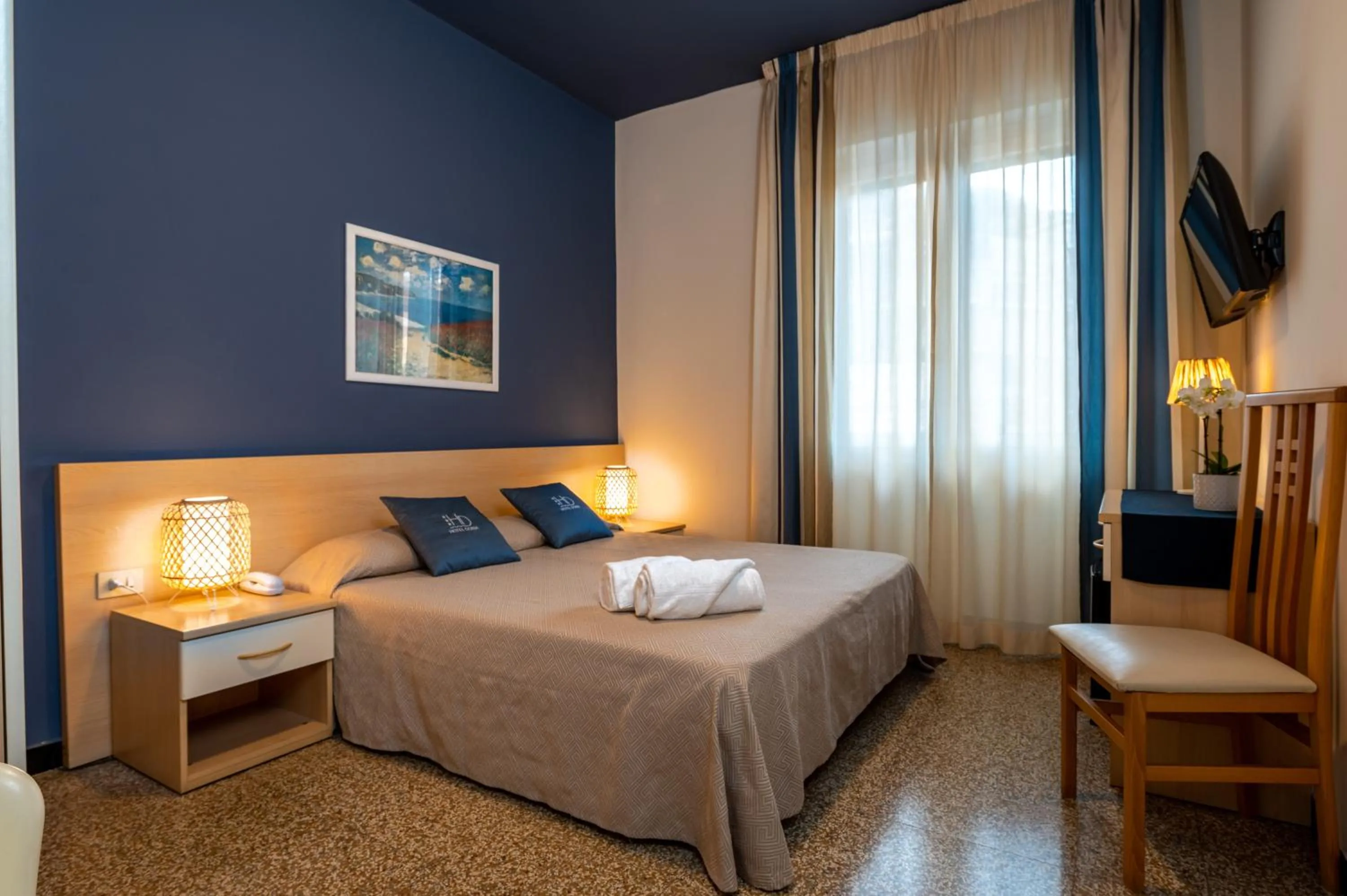 Bed in Hotel Doria