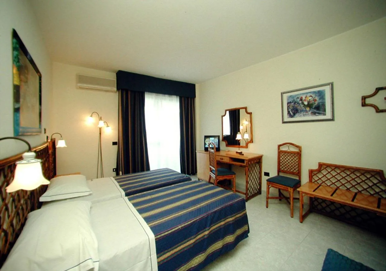 Quadruple Room with Balcony in Pugnochiuso Resort Hotel del Faro