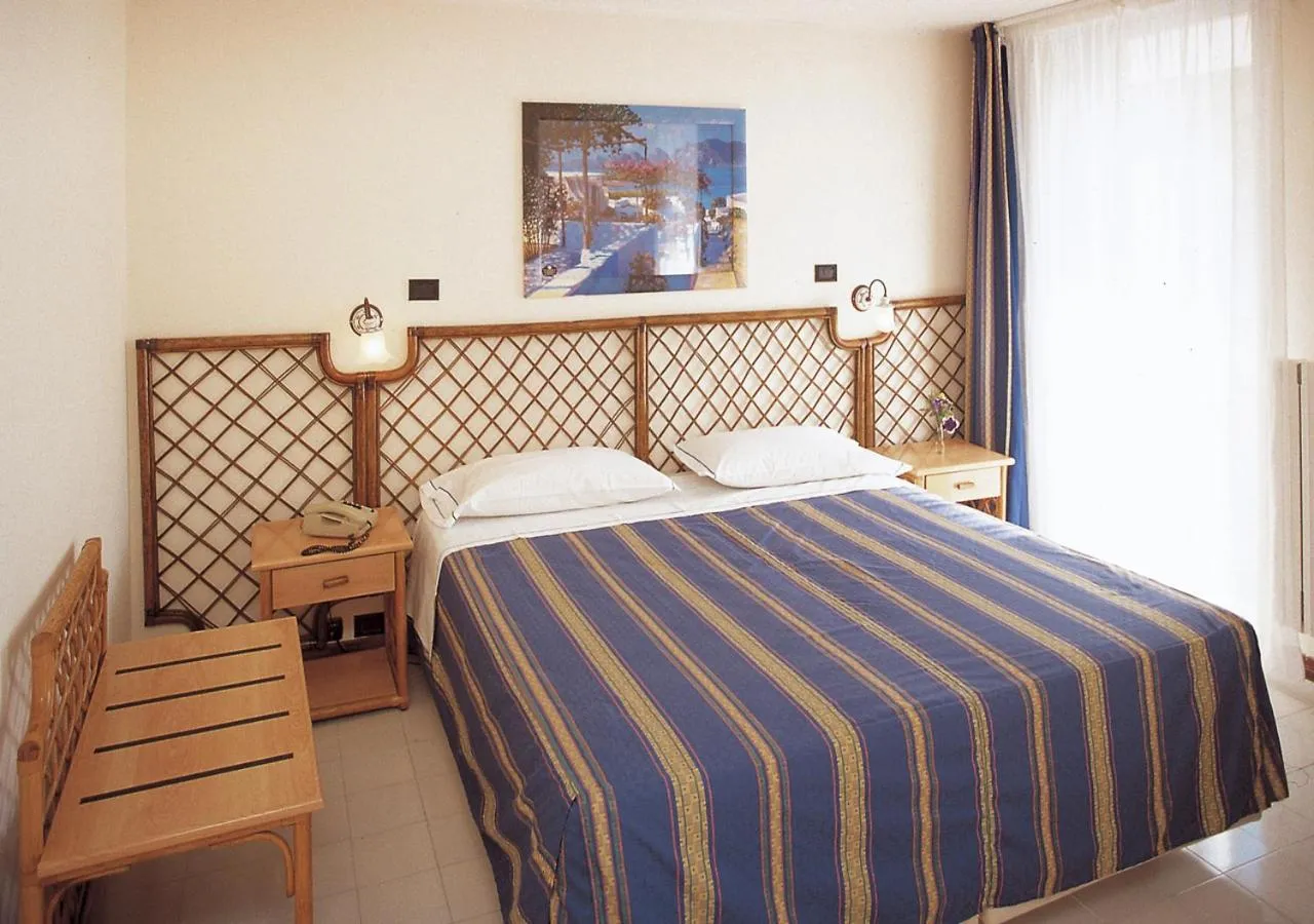 Quadruple Room with Balcony in Pugnochiuso Resort Hotel del Faro