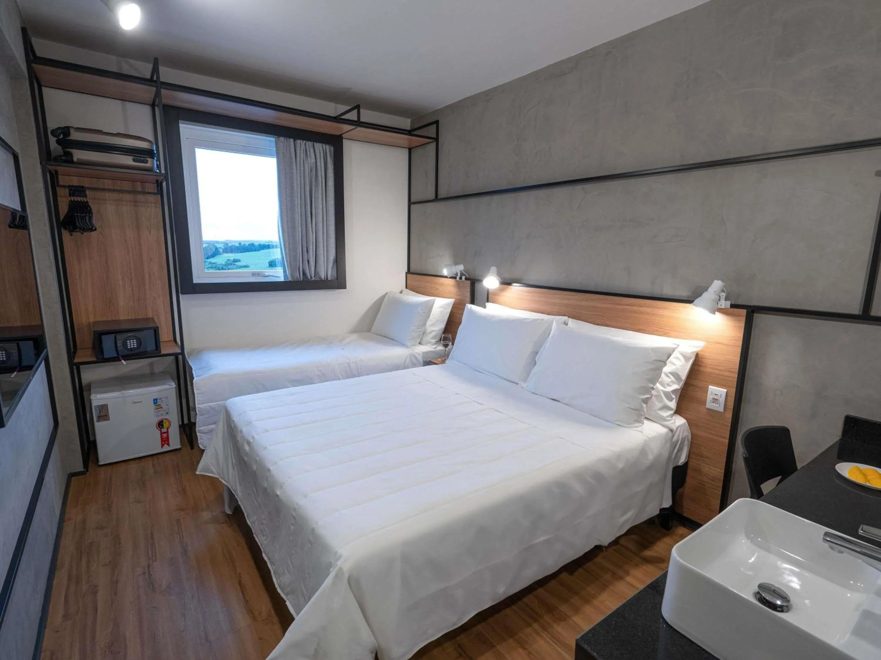 Standard Room with One Double Bed and One Single Bed - single occupancy in ibis Guarapuava