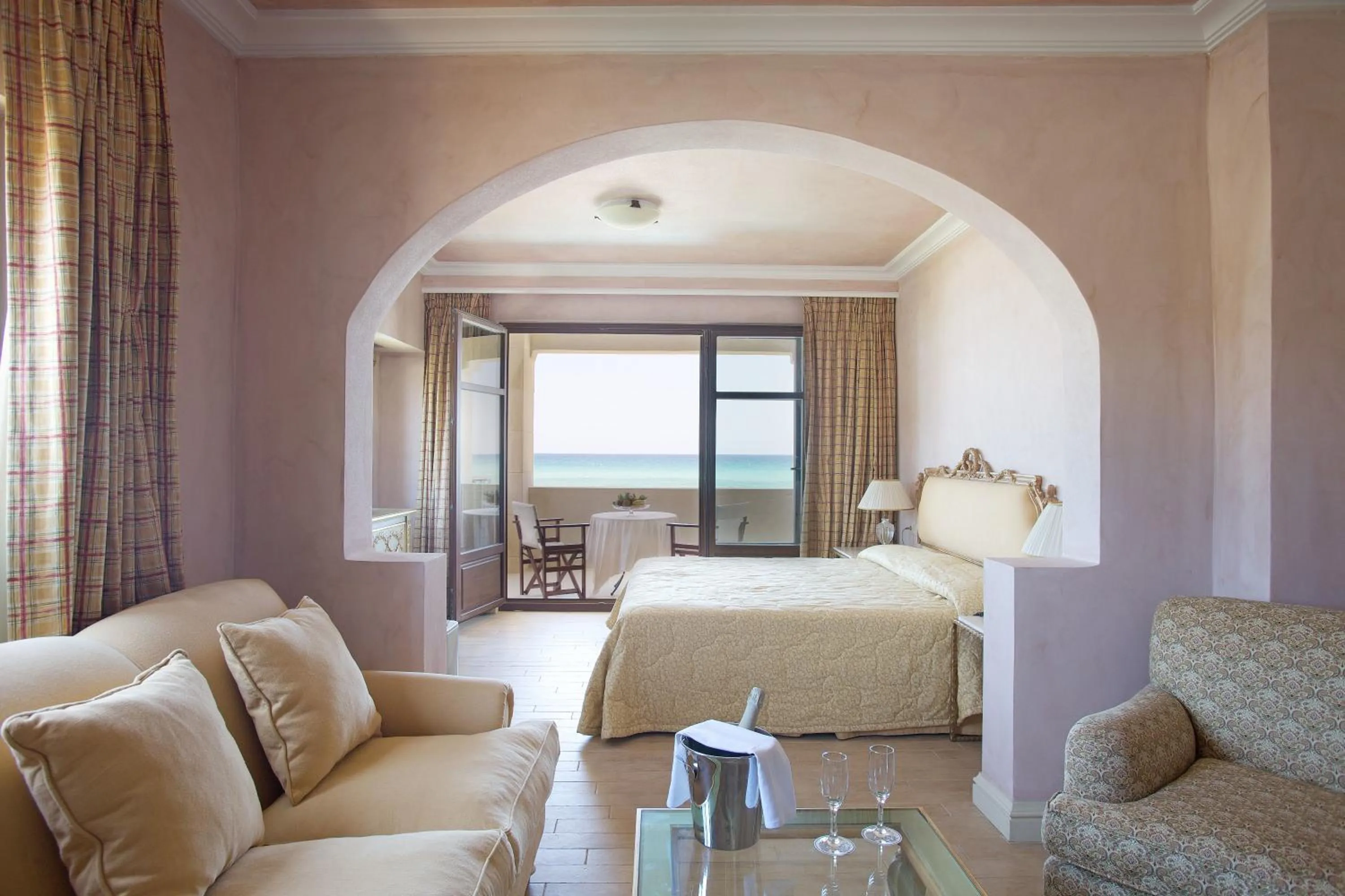 Seating area, Bed in Aquila Rithymna Beach